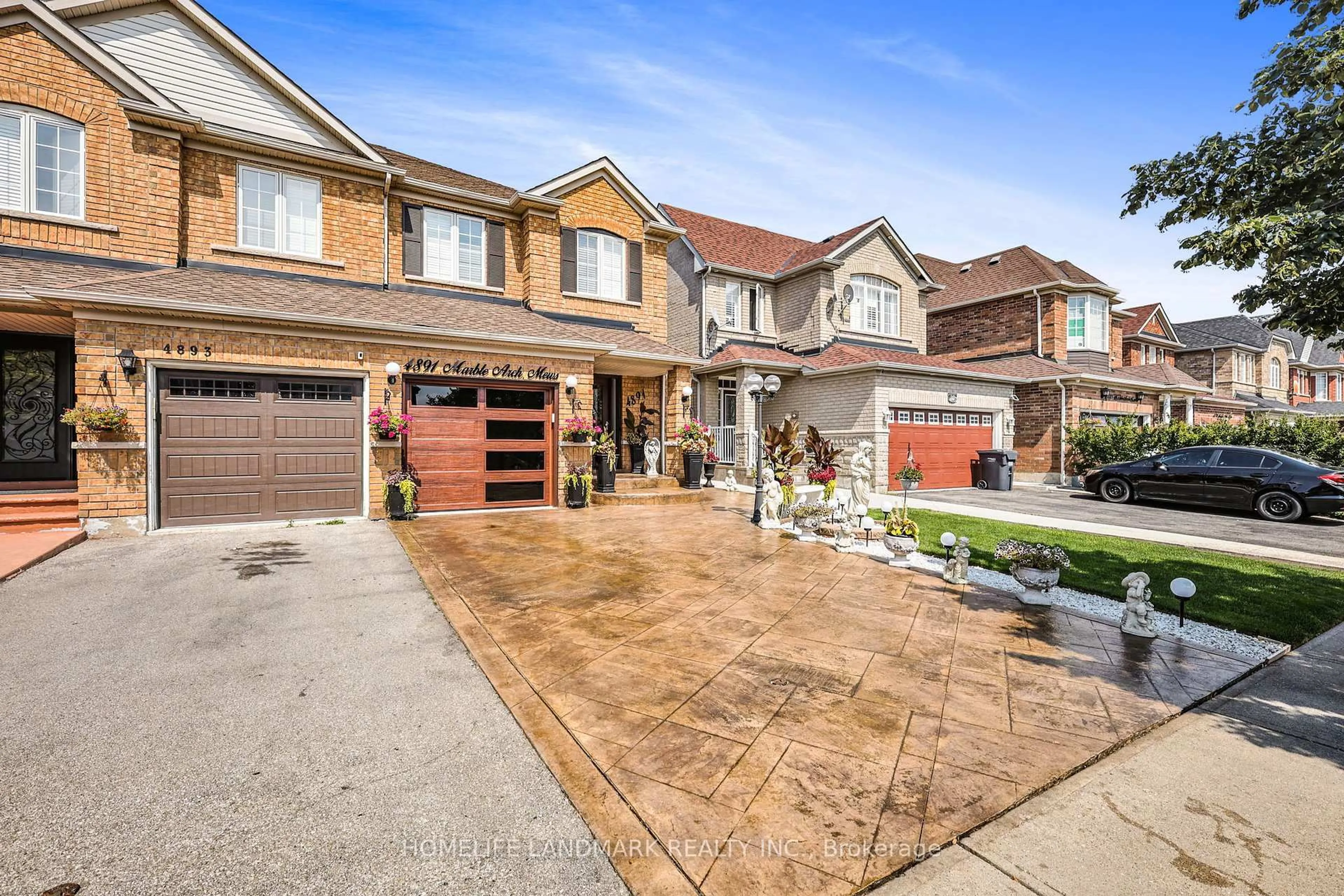 Home with brick exterior material, street for 4891 Marble Arch Mews, Mississauga Ontario L5M 7P7