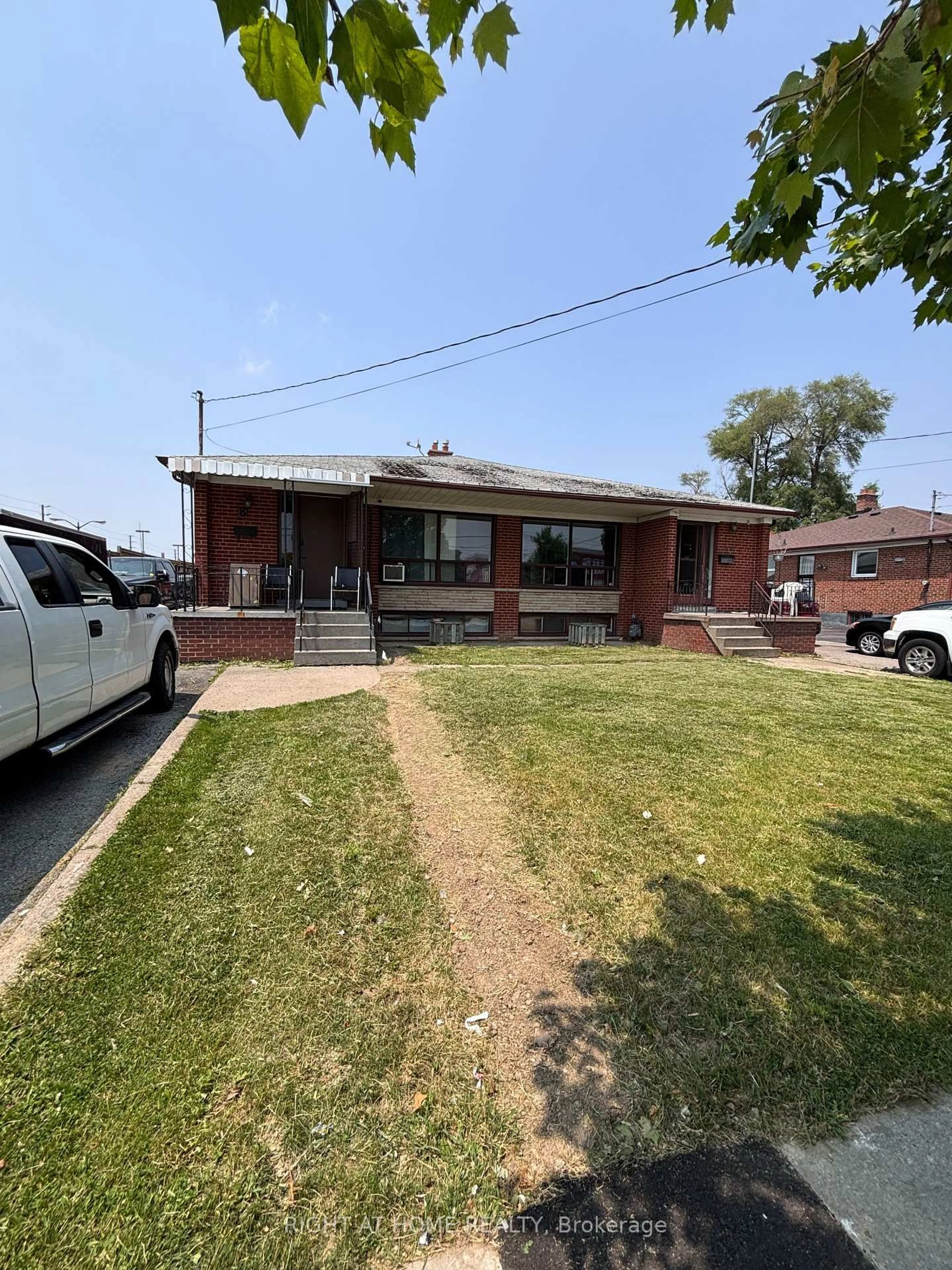 Home with brick exterior material, street for 8-10 Thistle Down Blvd, Toronto Ontario M9V 1H8