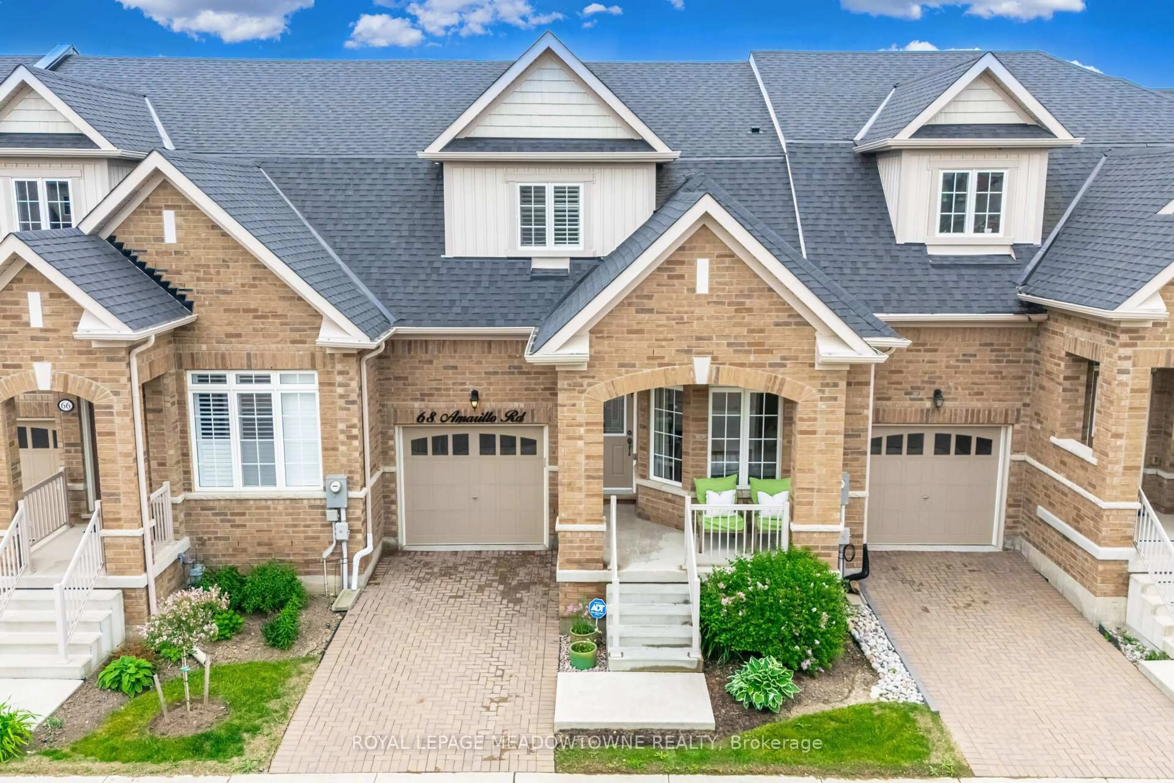 Home with brick exterior material, street for 68 Amarillo Rd, Brampton Ontario L6R 4A5