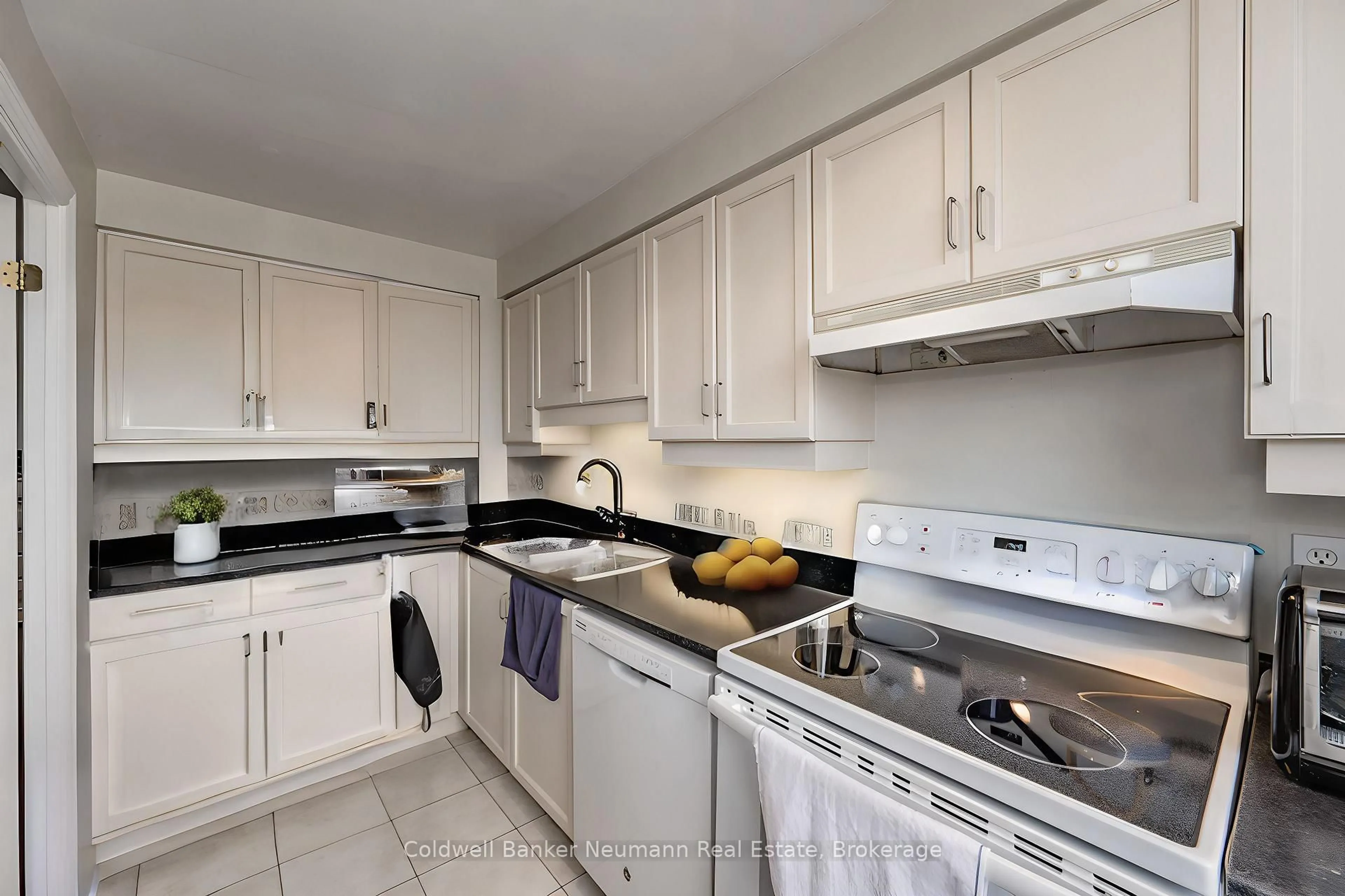 Standard kitchen, ceramic/tile floor for 60 Old Mill Rd #409, Oakville Ontario L6J 7V9