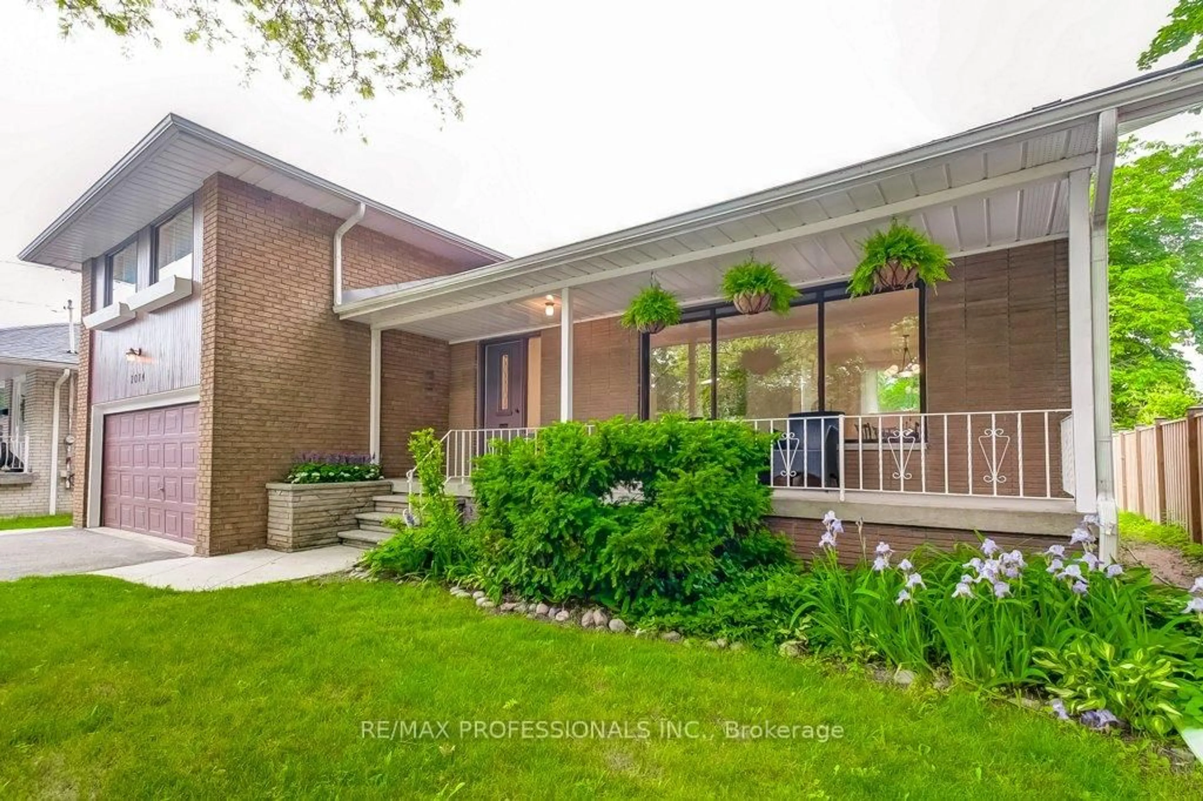 Home with brick exterior material, street for 2074 Feldwood Rd, Mississauga Ontario L4X 1E9