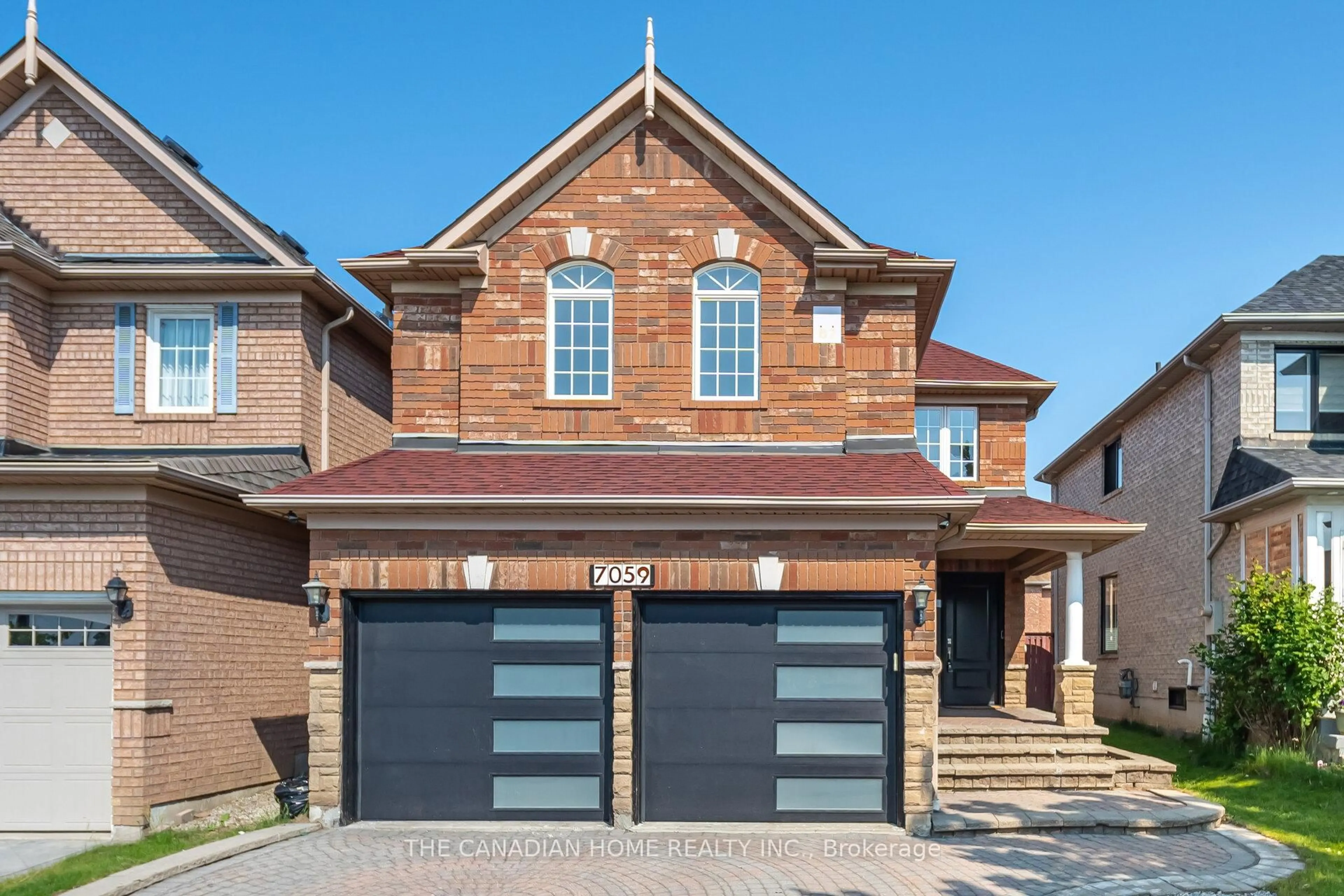 Home with brick exterior material, street for 7059 Magistrate Terr, Mississauga Ontario L5W 1E5