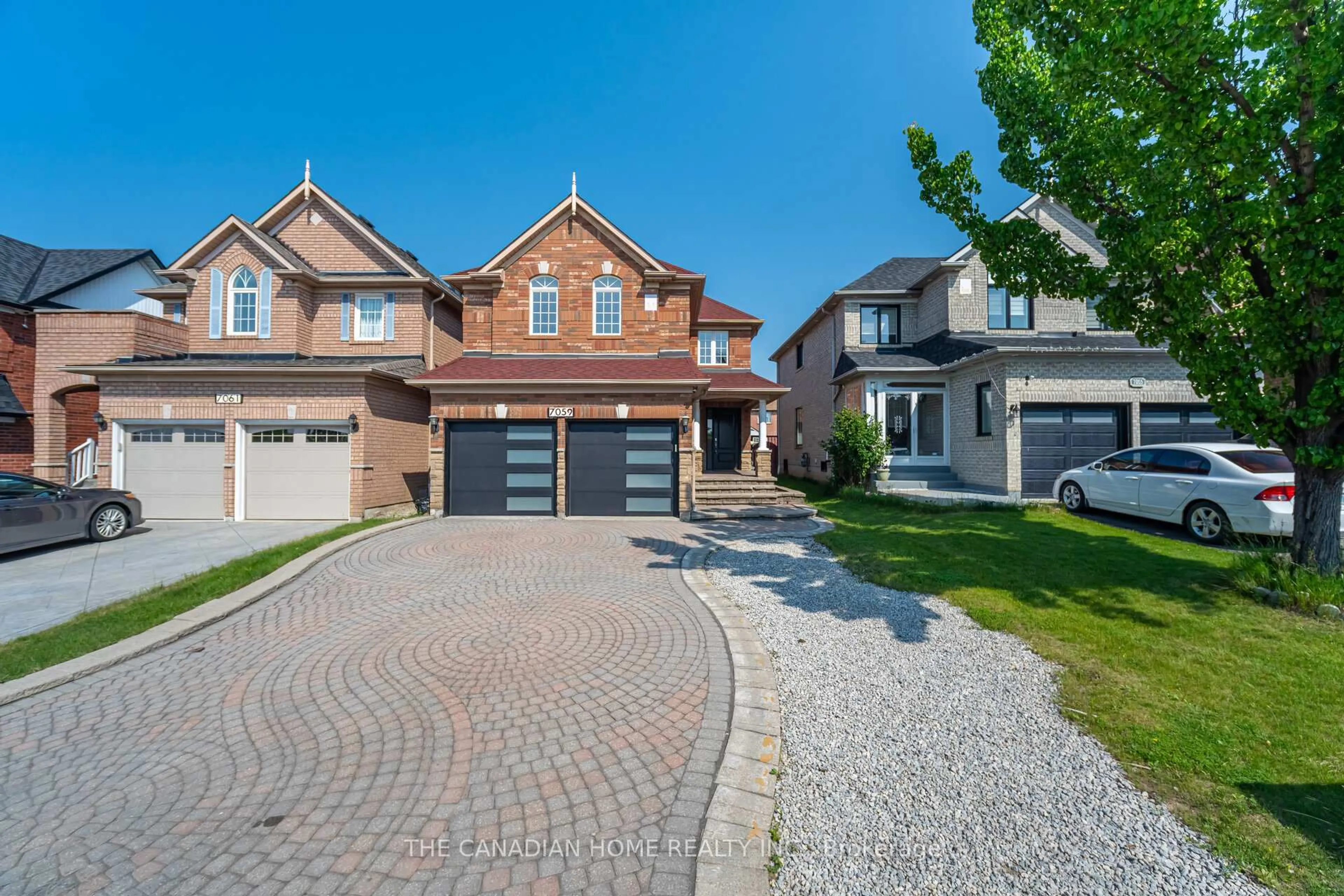 Home with brick exterior material, street for 7059 Magistrate Terr, Mississauga Ontario L5W 1E5
