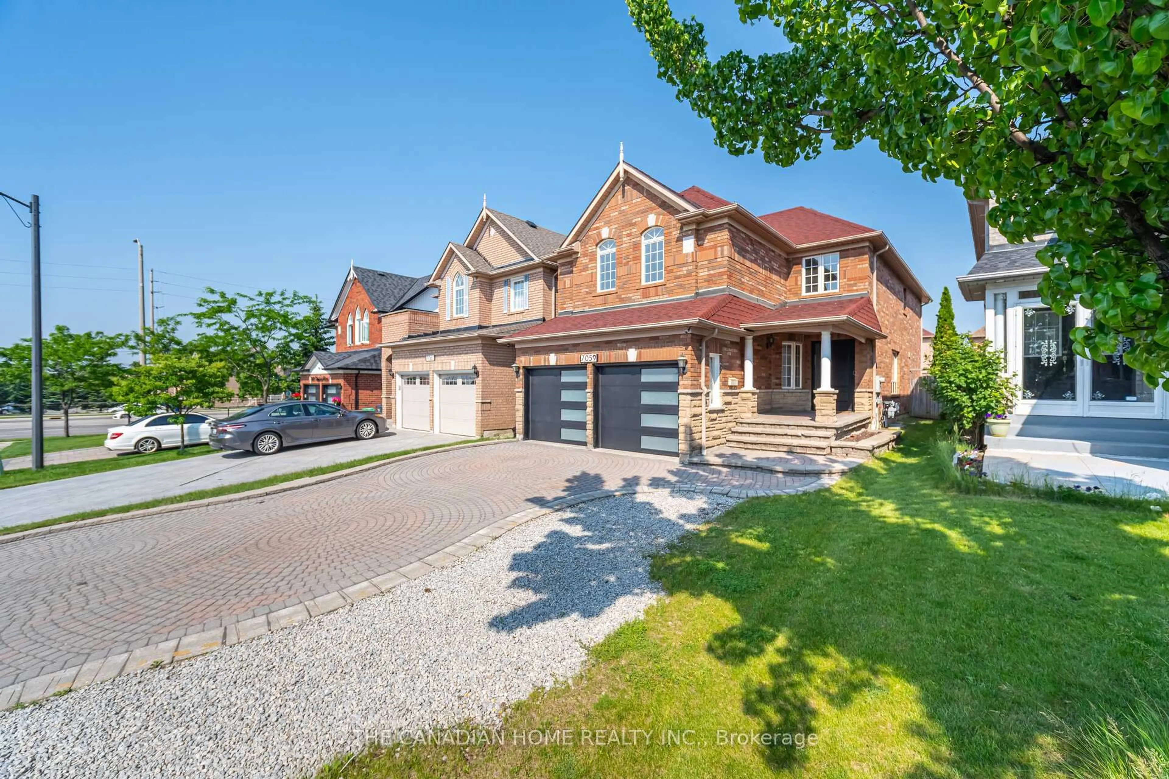 Home with brick exterior material, street for 7059 Magistrate Terr, Mississauga Ontario L5W 1E5