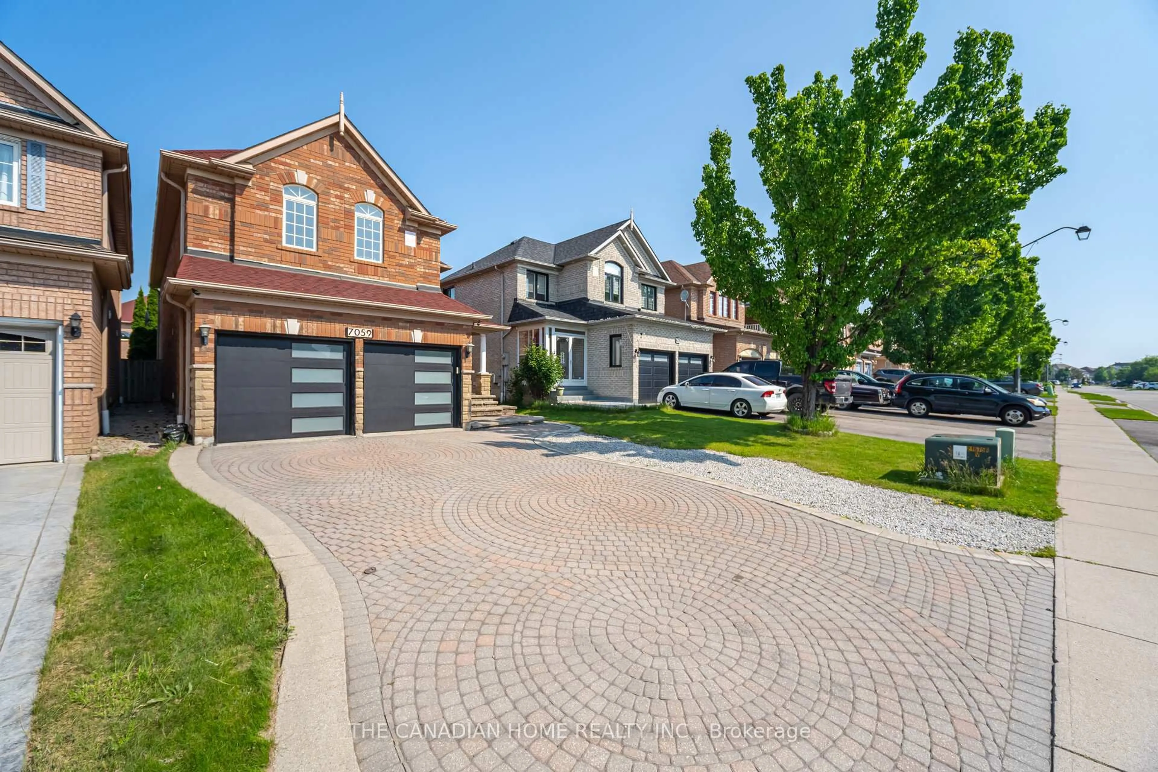 Home with brick exterior material, street for 7059 Magistrate Terr, Mississauga Ontario L5W 1E5