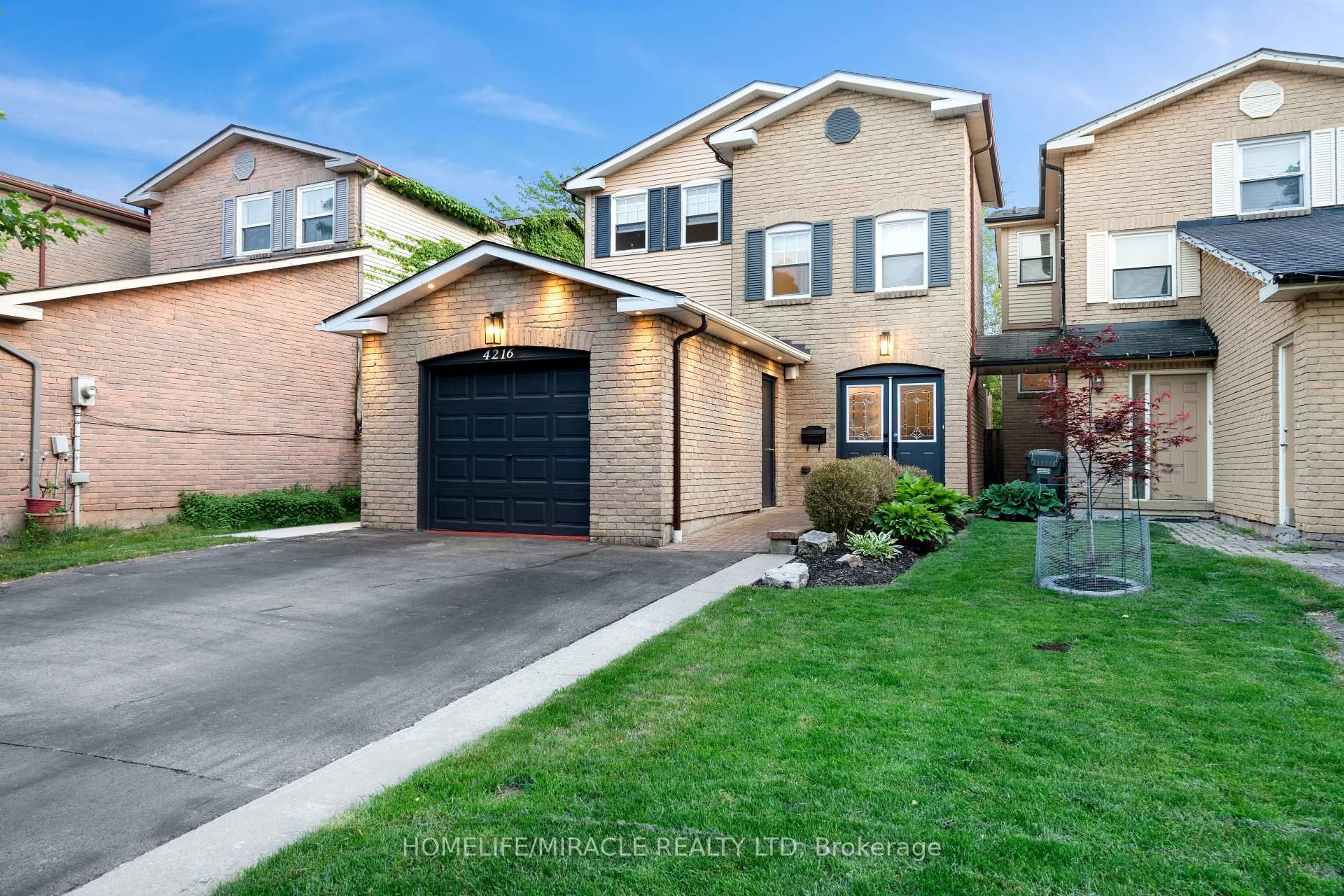 Home with brick exterior material, street for 4216 Sunflower Dr, Mississauga Ontario L5L 2L5
