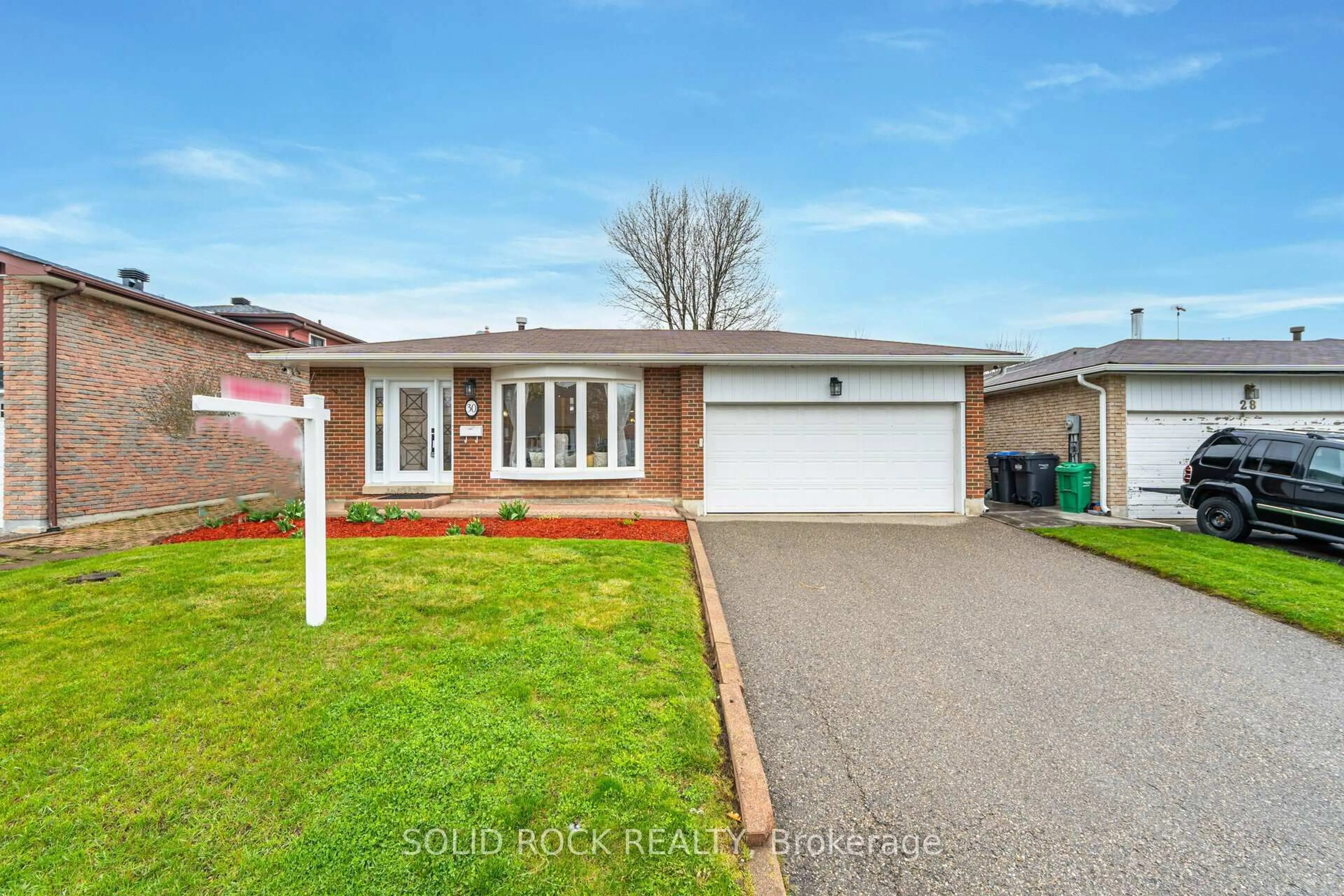 Home with brick exterior material, street for 30 Pleasantview Ave, Brampton Ontario L6X 2M9