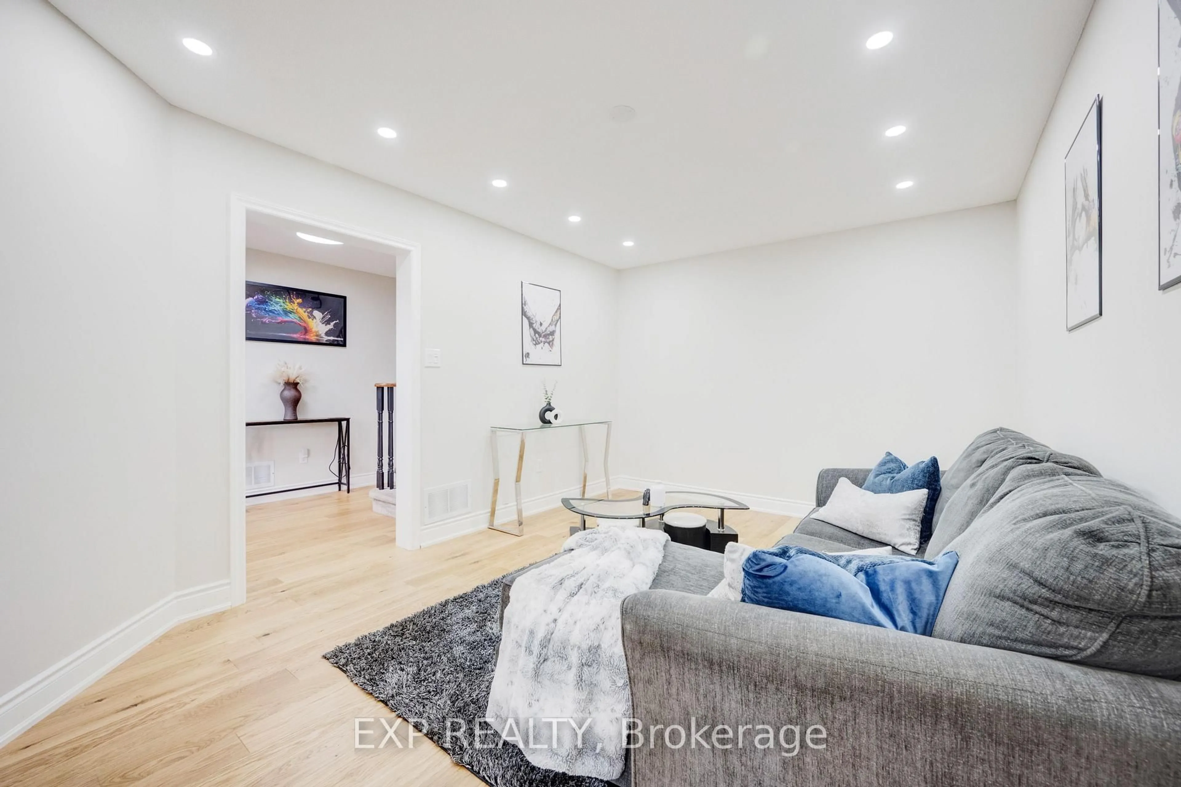 Living room with furniture, wood/laminate floor for 5 Watson Rd, Halton Hills Ontario L7G 5N8