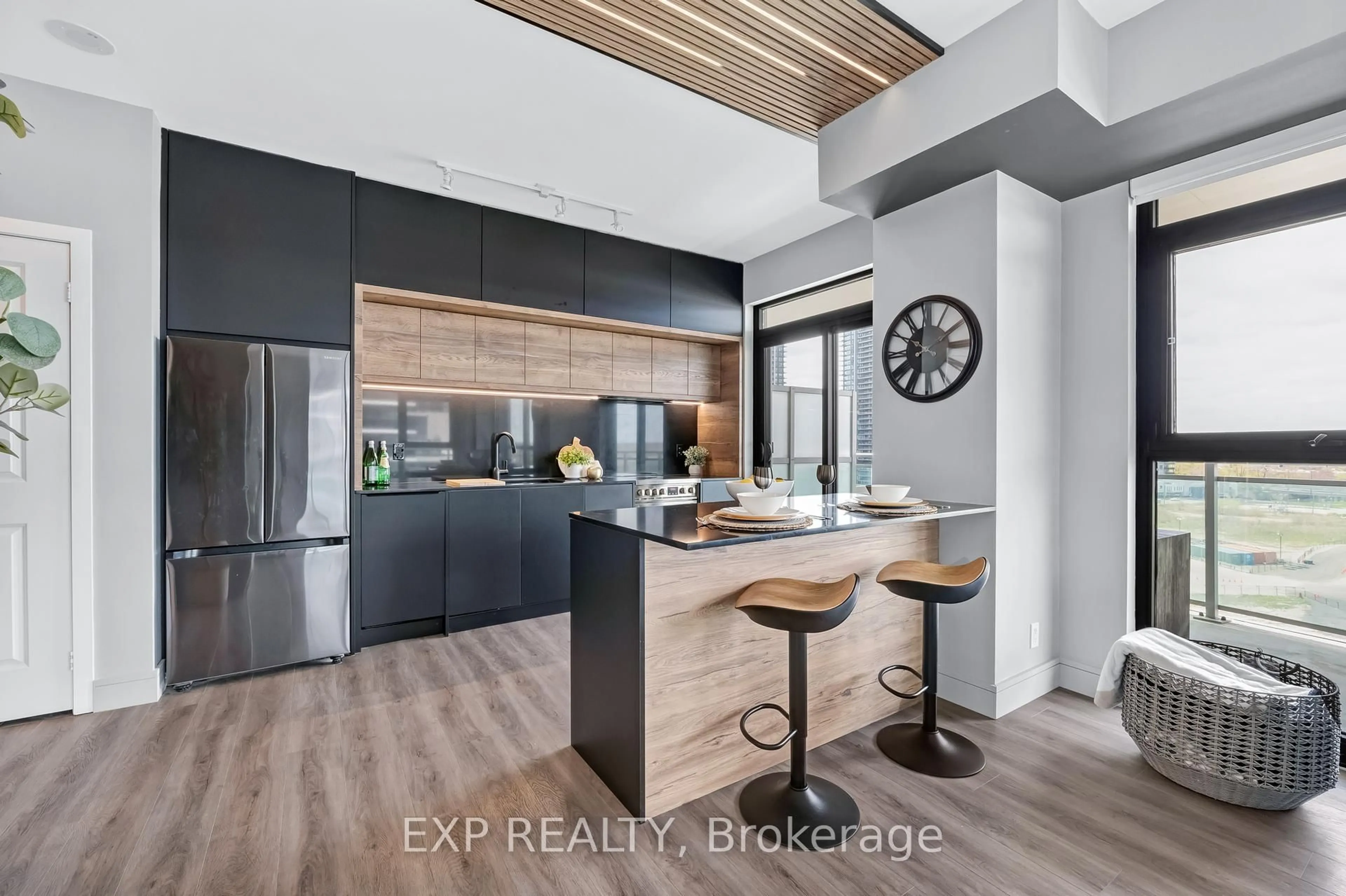 Open concept kitchen, wood/laminate floor for 33 Shore Breeze Dr #904, Toronto Ontario M8V 1A1
