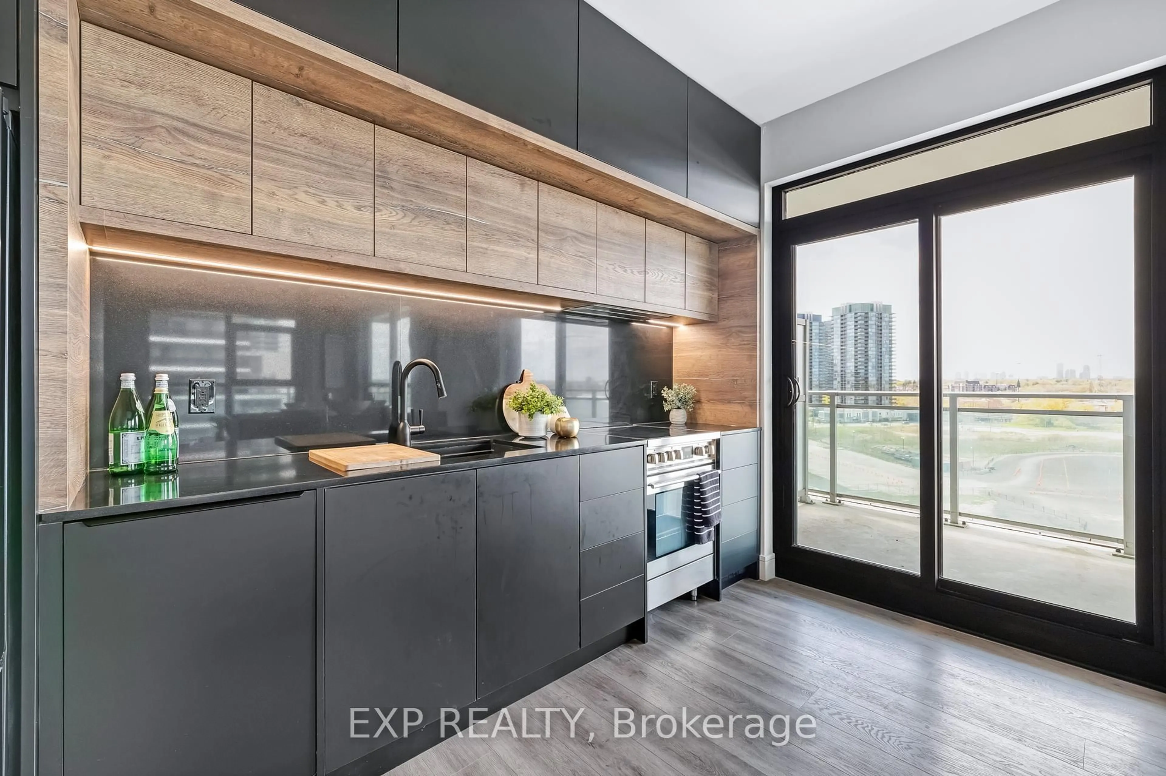 Contemporary kitchen, wood/laminate floor for 33 Shore Breeze Dr #904, Toronto Ontario M8V 1A1