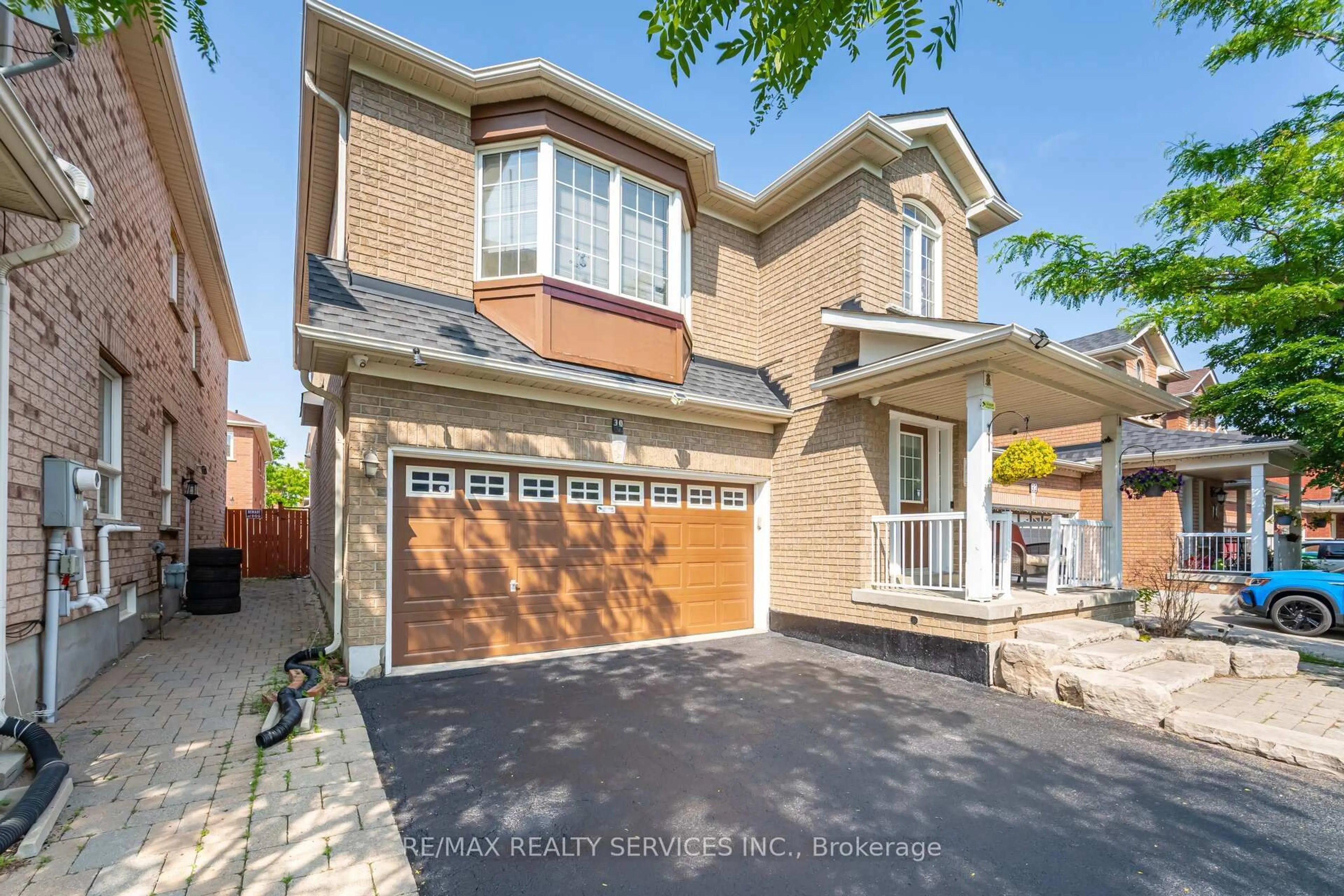 Home with brick exterior material, street for 30 Sams Cres, Brampton Ontario L7A 3R7