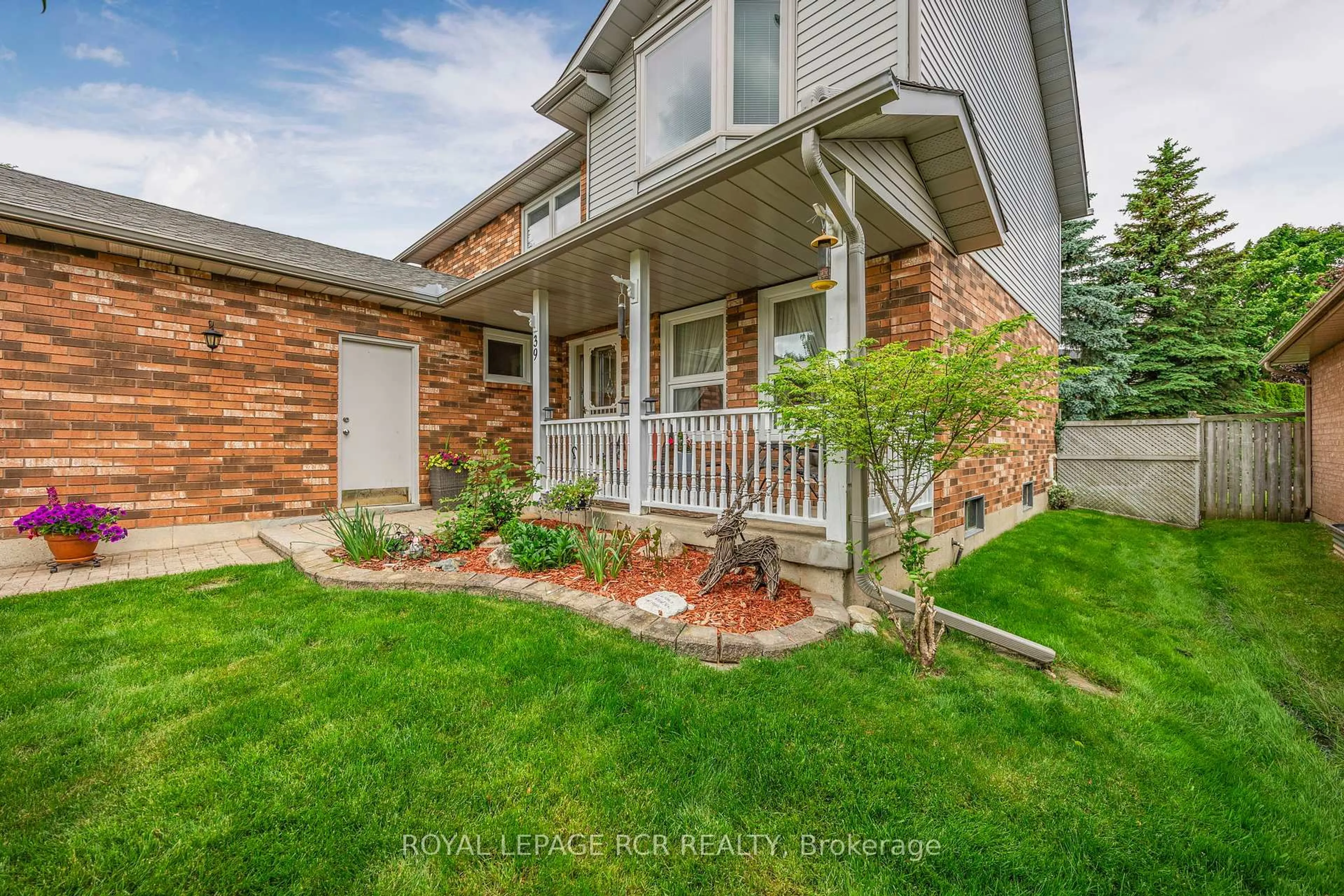 Home with brick exterior material, street for 39 Passmore Ave, Orangeville Ontario L9W 4K4