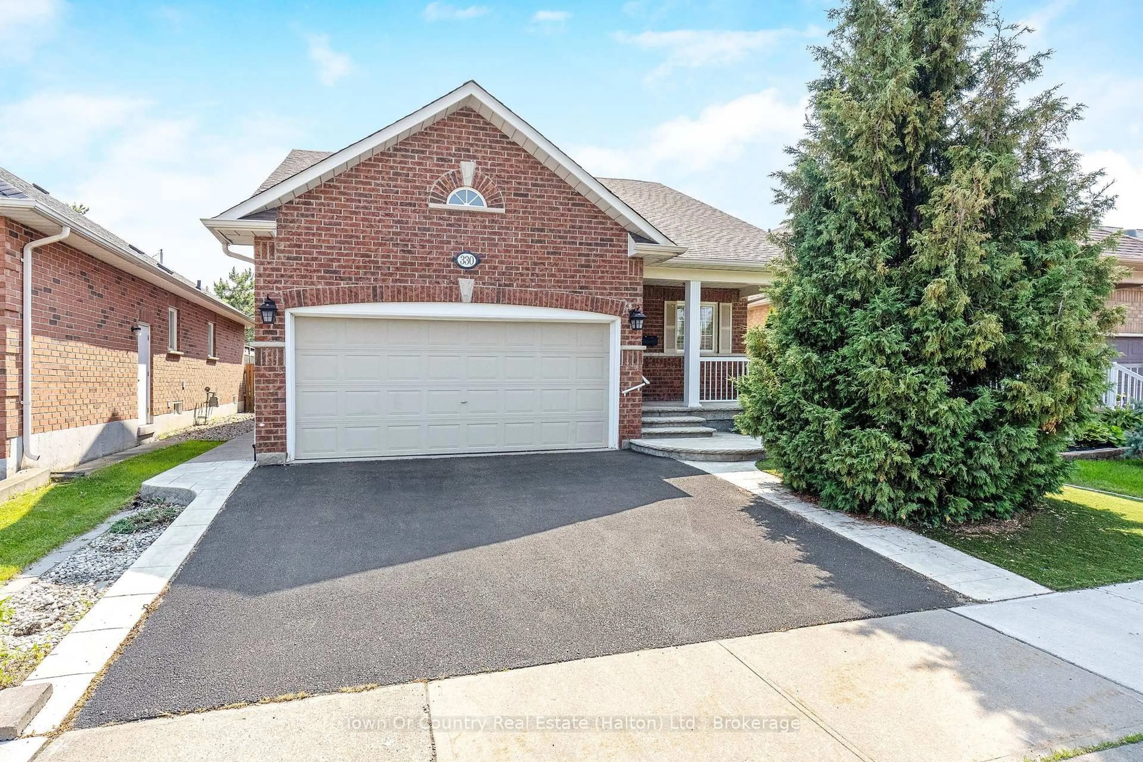 Home with brick exterior material, street for 330 Centennial Forest Dr, Milton Ontario L9T 5X3
