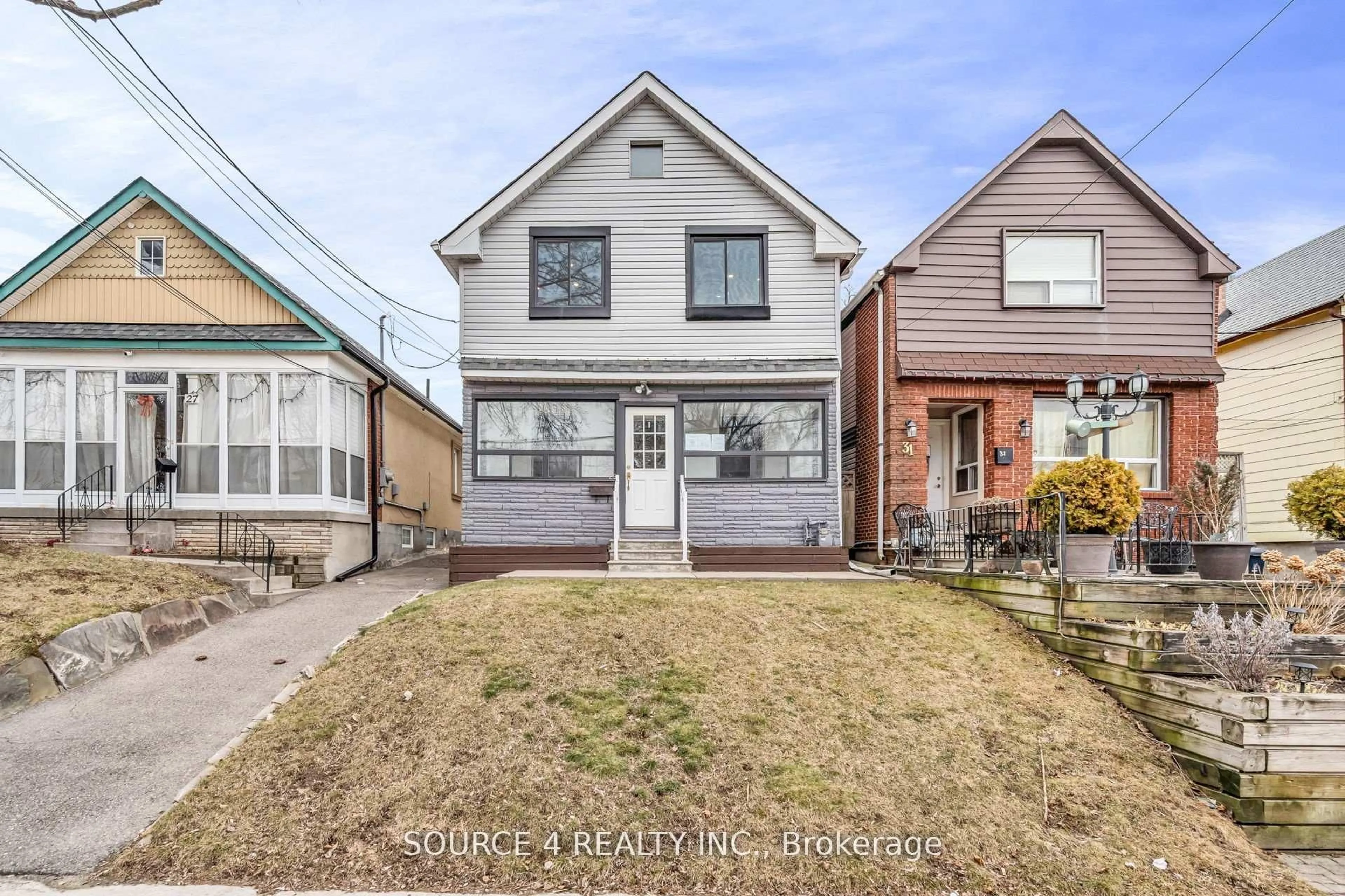 Home with vinyl exterior material, street for 29 Hillary Ave, Toronto Ontario M6N 2B9