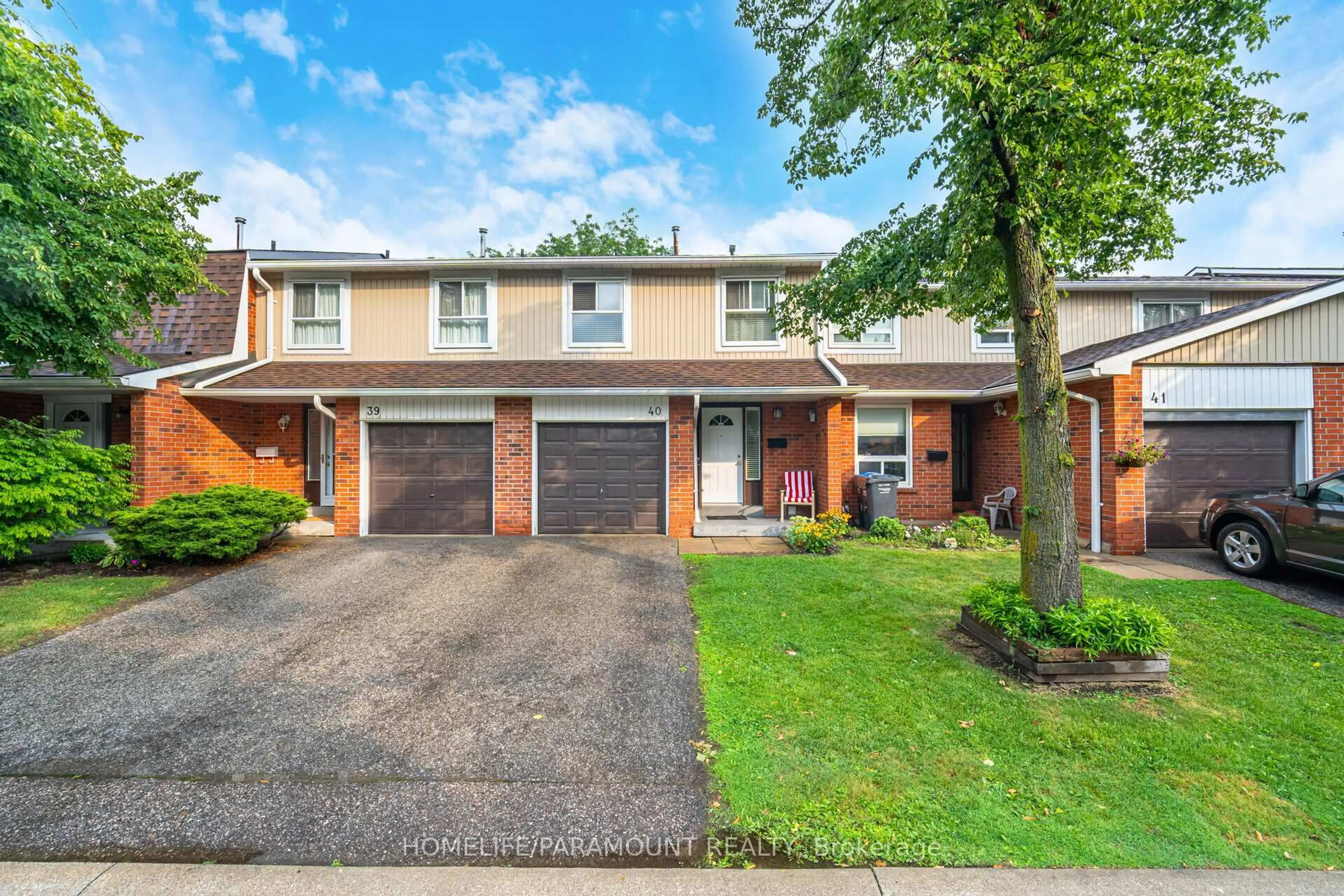 Home with brick exterior material, street for 345 Meadows Blvd #40, Mississauga Ontario L4Z 1G5