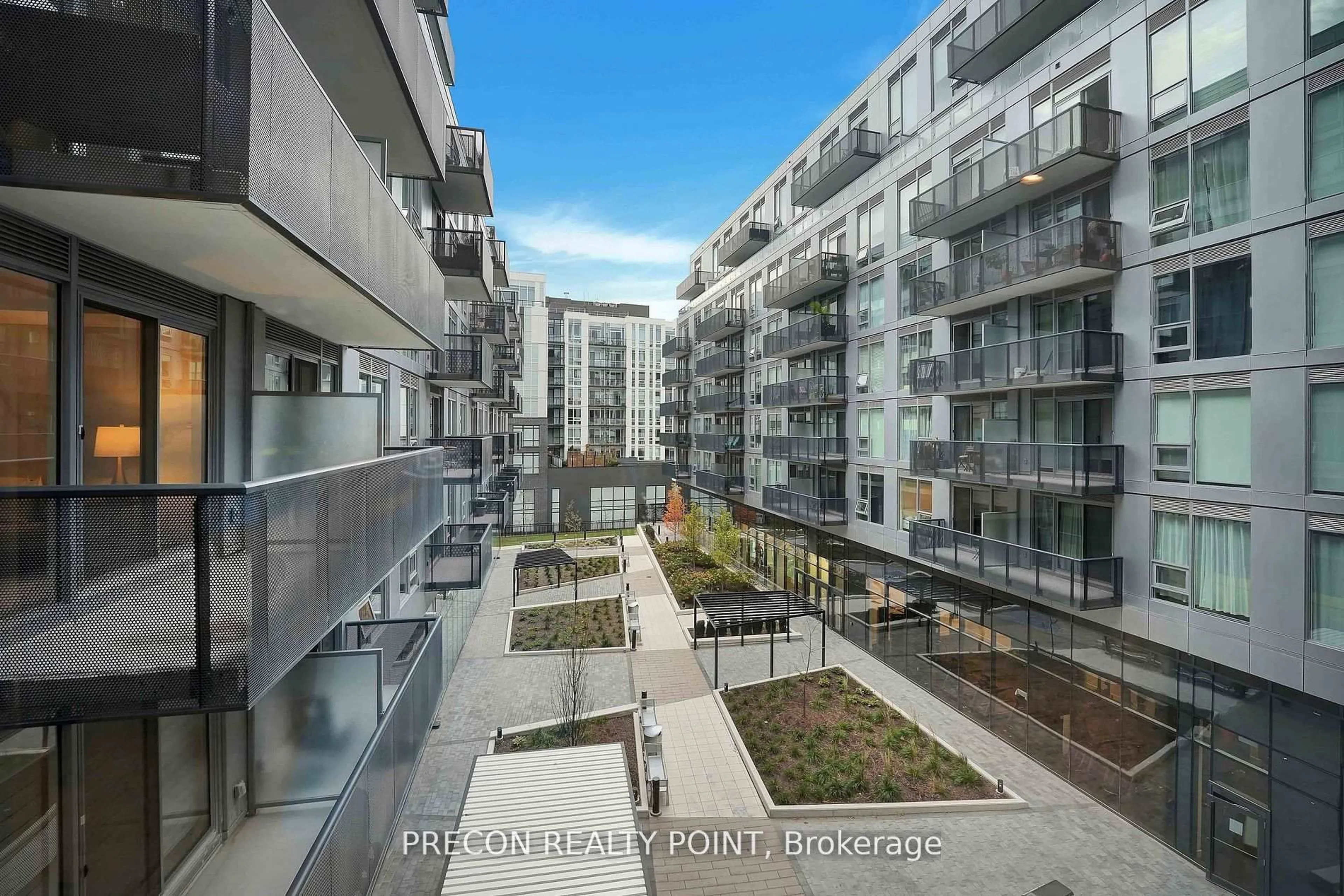 Patio, city buildings view from balcony for 2450 Old Bronte Rd #322, Oakville Ontario L5M 5P6