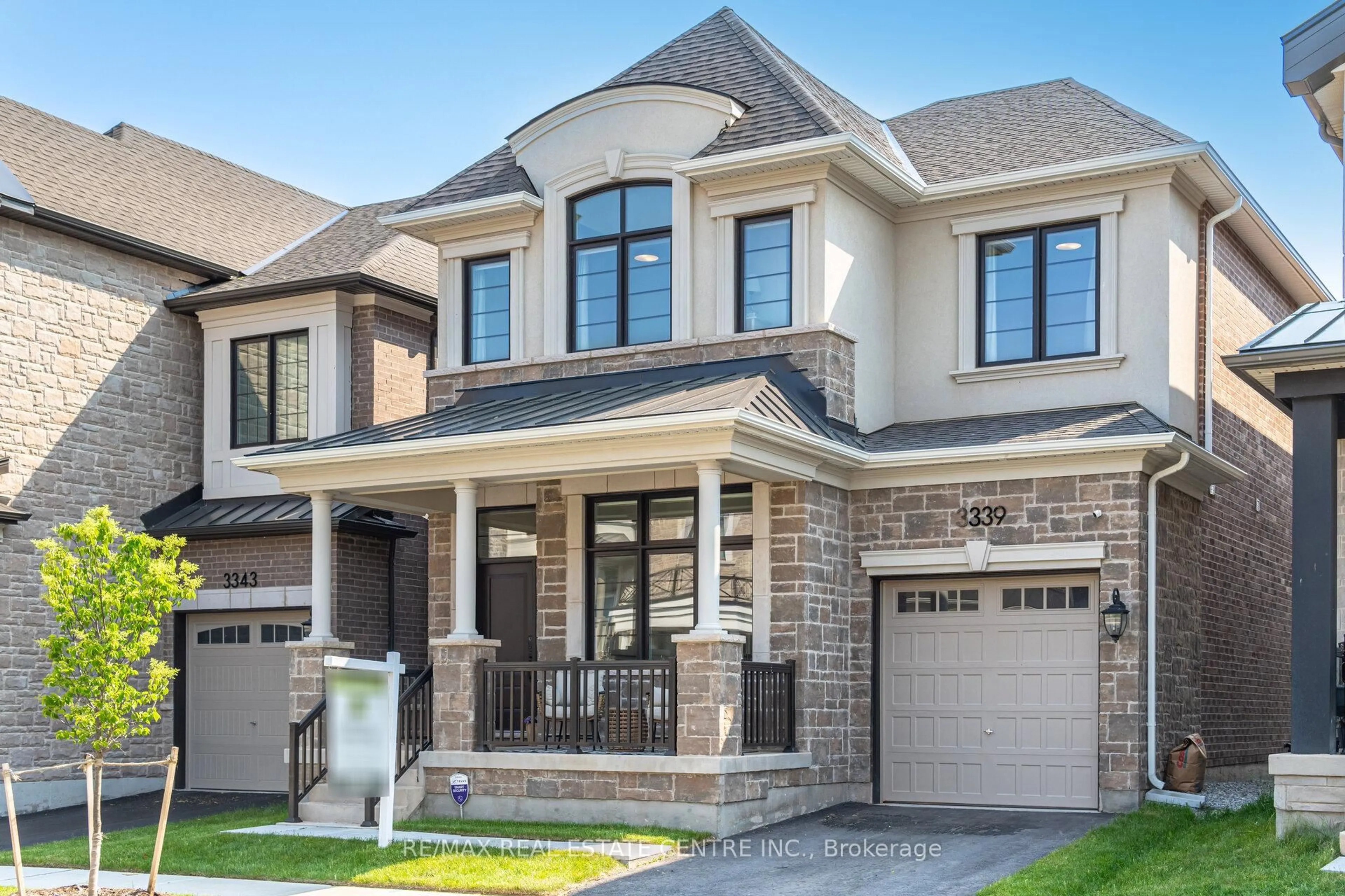 Home with brick exterior material, street for 3339 Harasym Tr, Oakville Ontario L6M 5N8