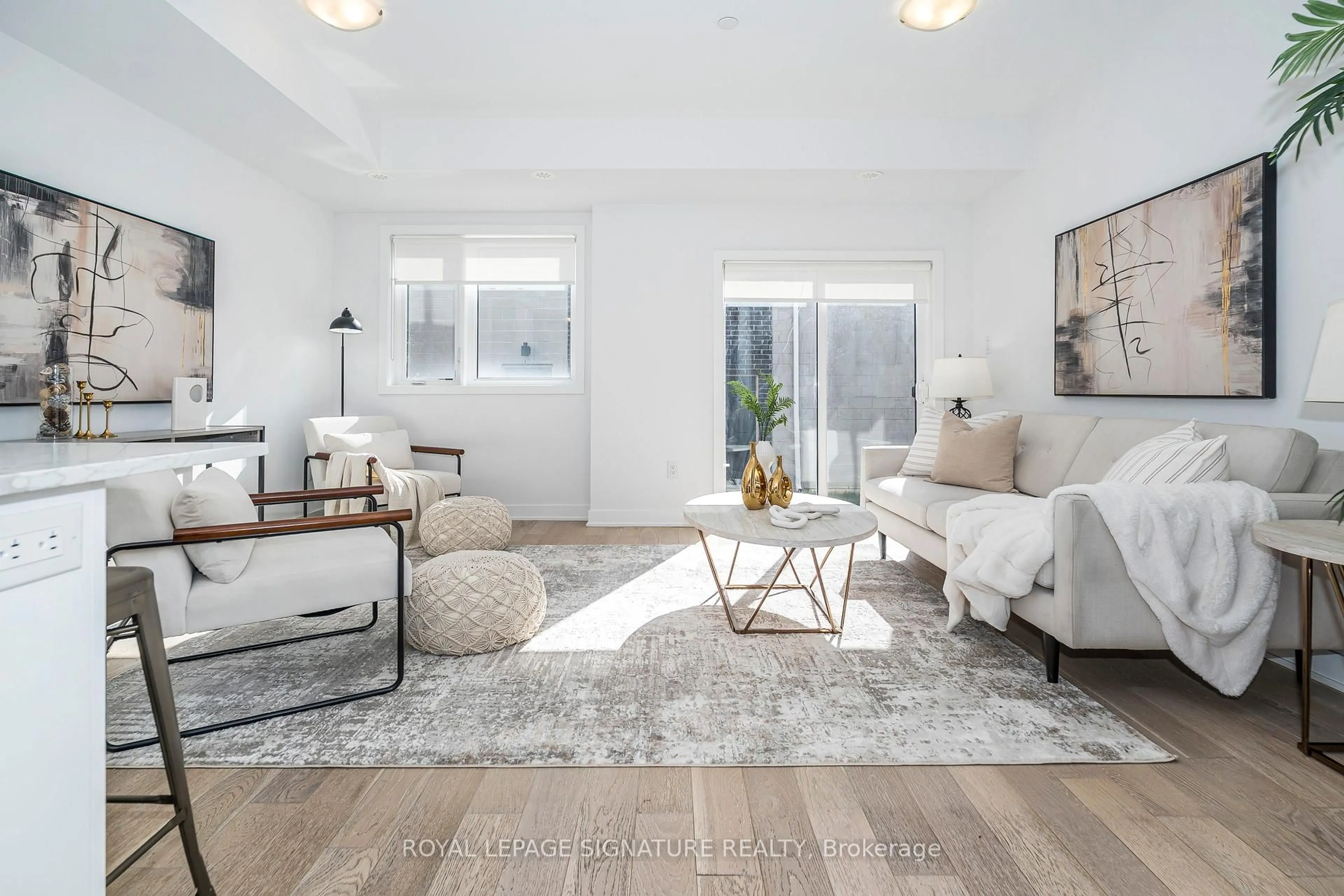 Living room with furniture, unknown for 71 Frederick Tisdale Dr, Toronto Ontario M3K 0C5
