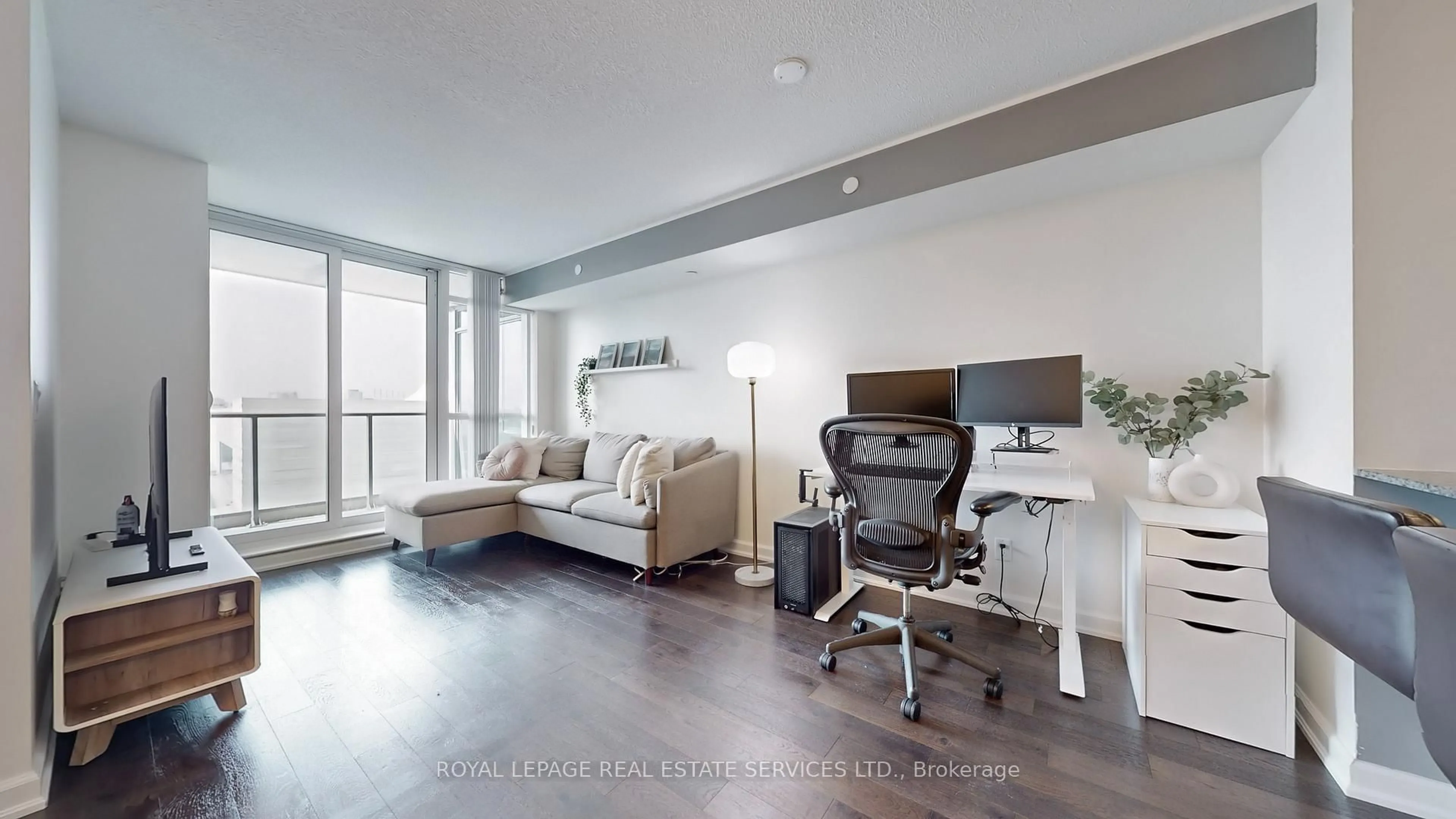 Living room with furniture, wood/laminate floor for 205 Sherway Gardens Rd #504, Toronto Ontario M9C 0A5
