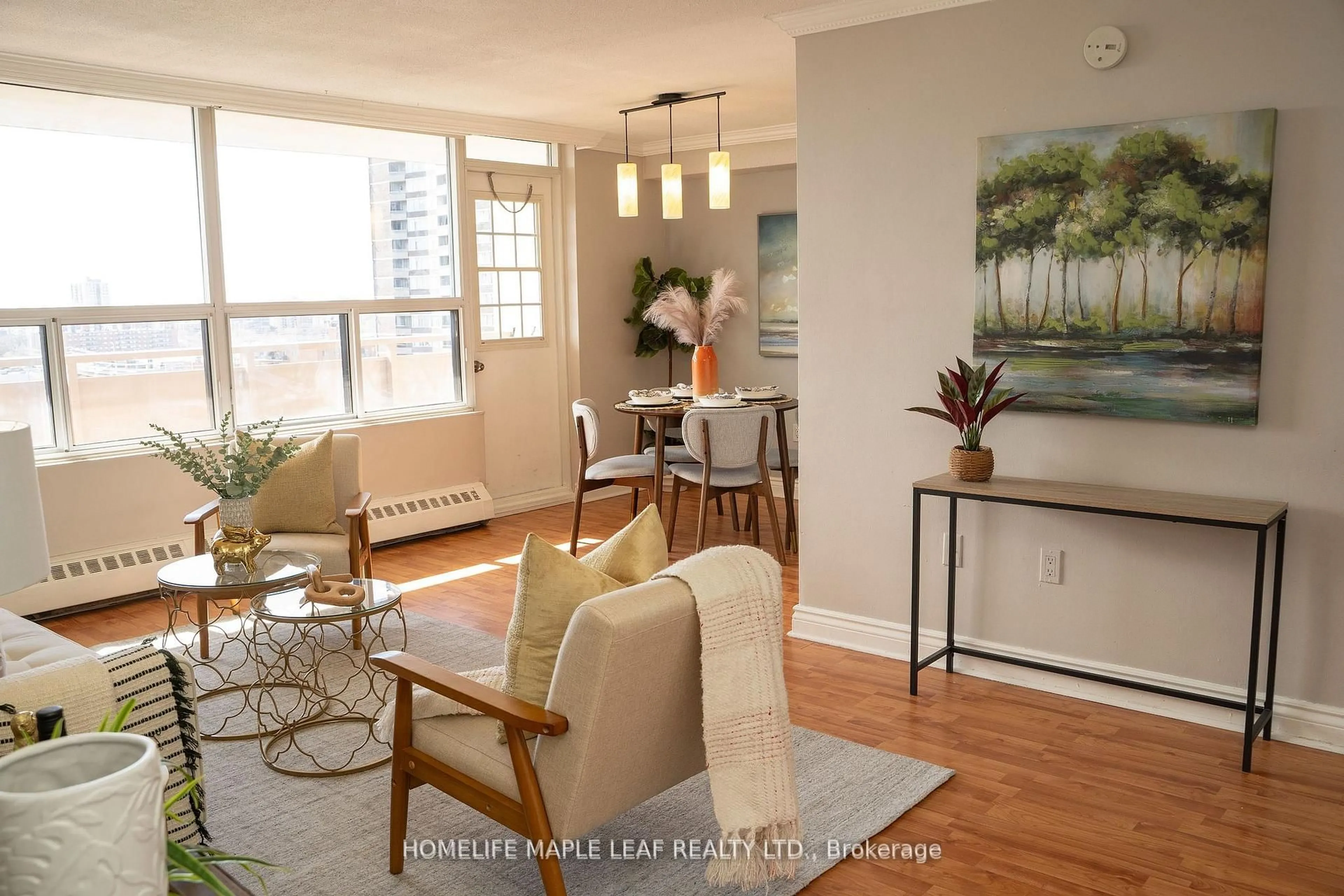 Living room with furniture, wood/laminate floor for 3120 Kirwin Ave #908, Mississauga Ontario L5A 3R2