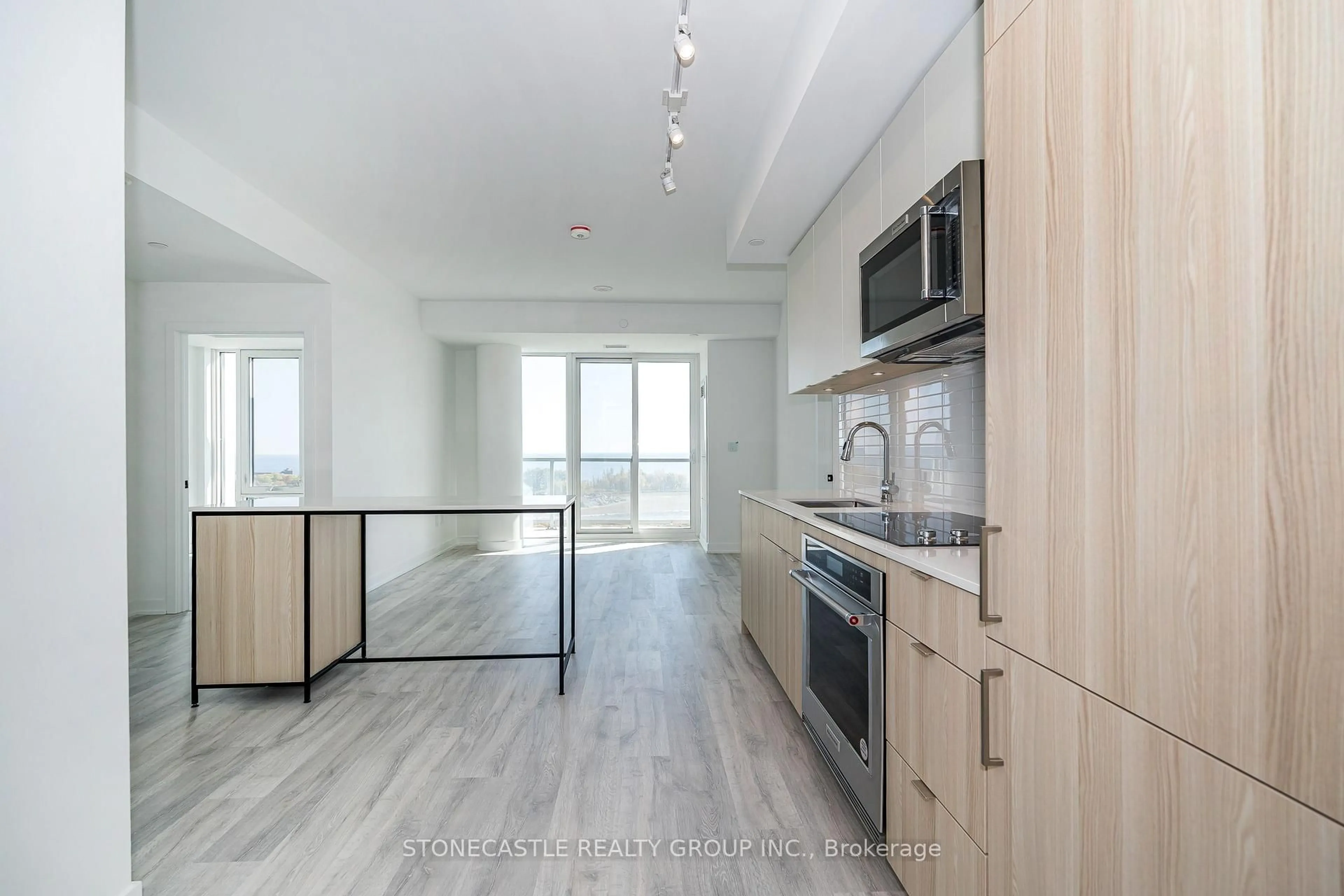 Open concept kitchen, unknown for 220 Missinnihe Way #906, Mississauga Ontario L6A 5A8