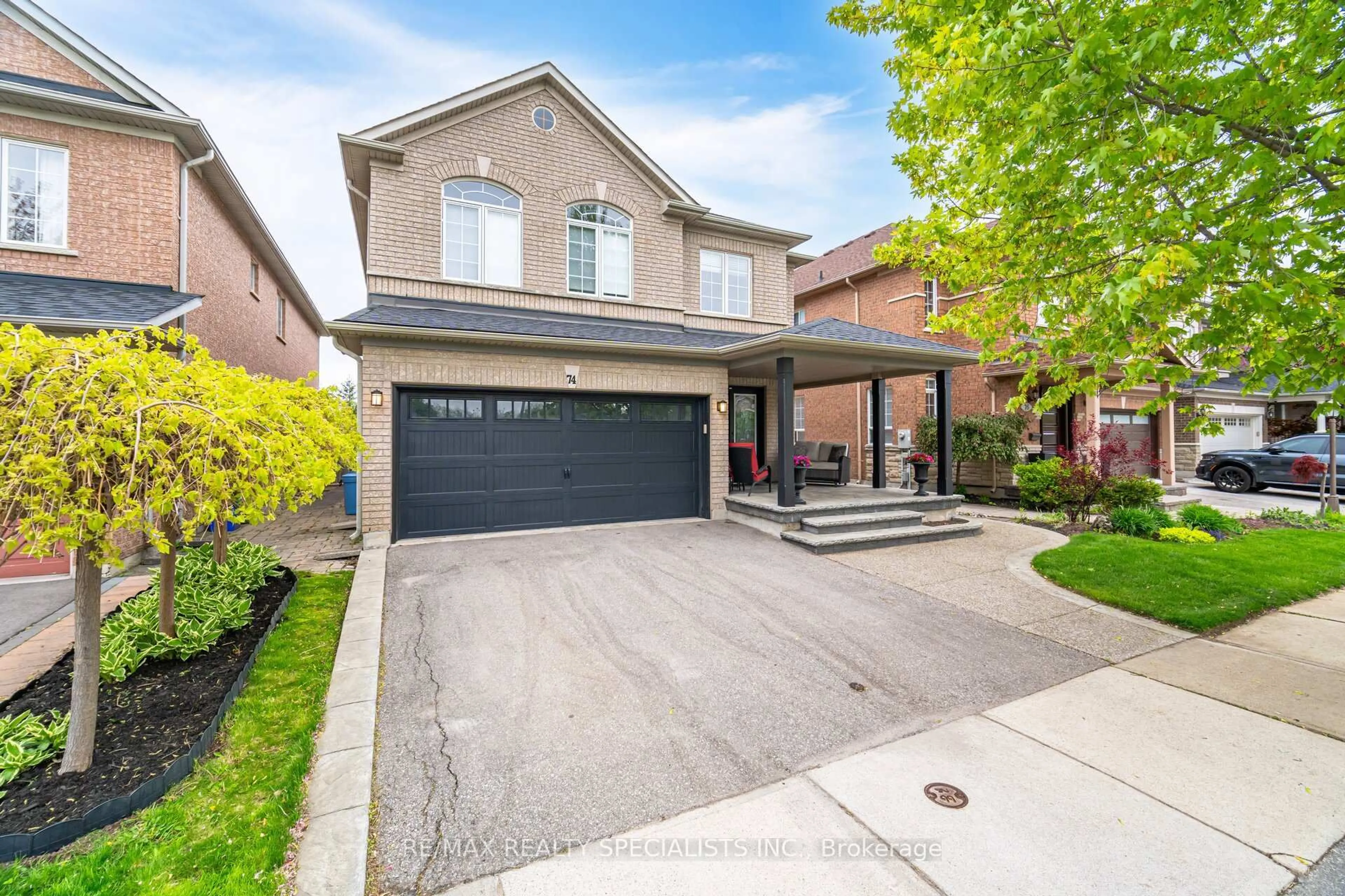 Home with brick exterior material, street for 74 Robarts Dr, Milton Ontario L9T 5P3