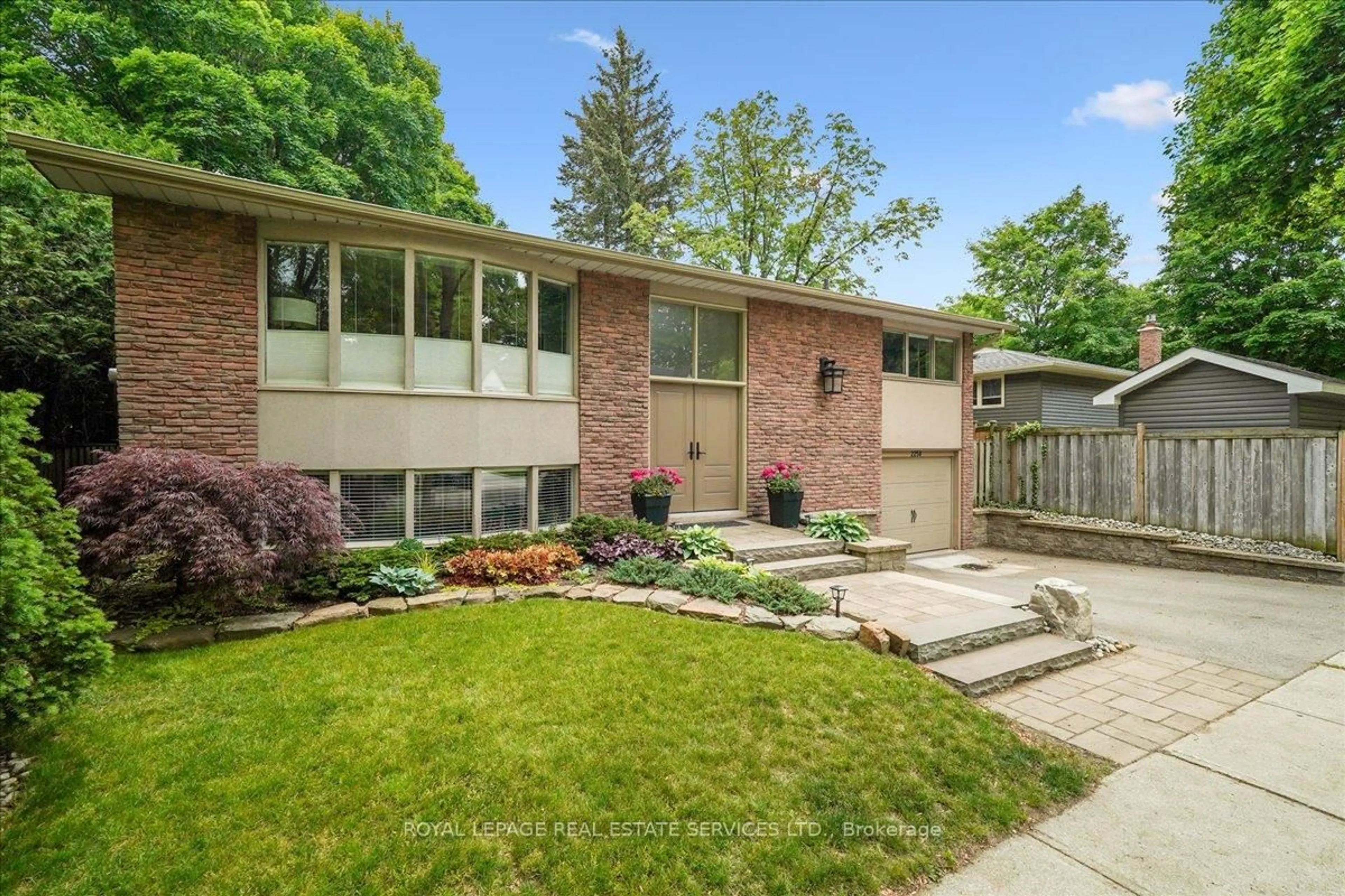 Home with brick exterior material, street for 2250 Dunedin Rd, Oakville Ontario L6J 5V5