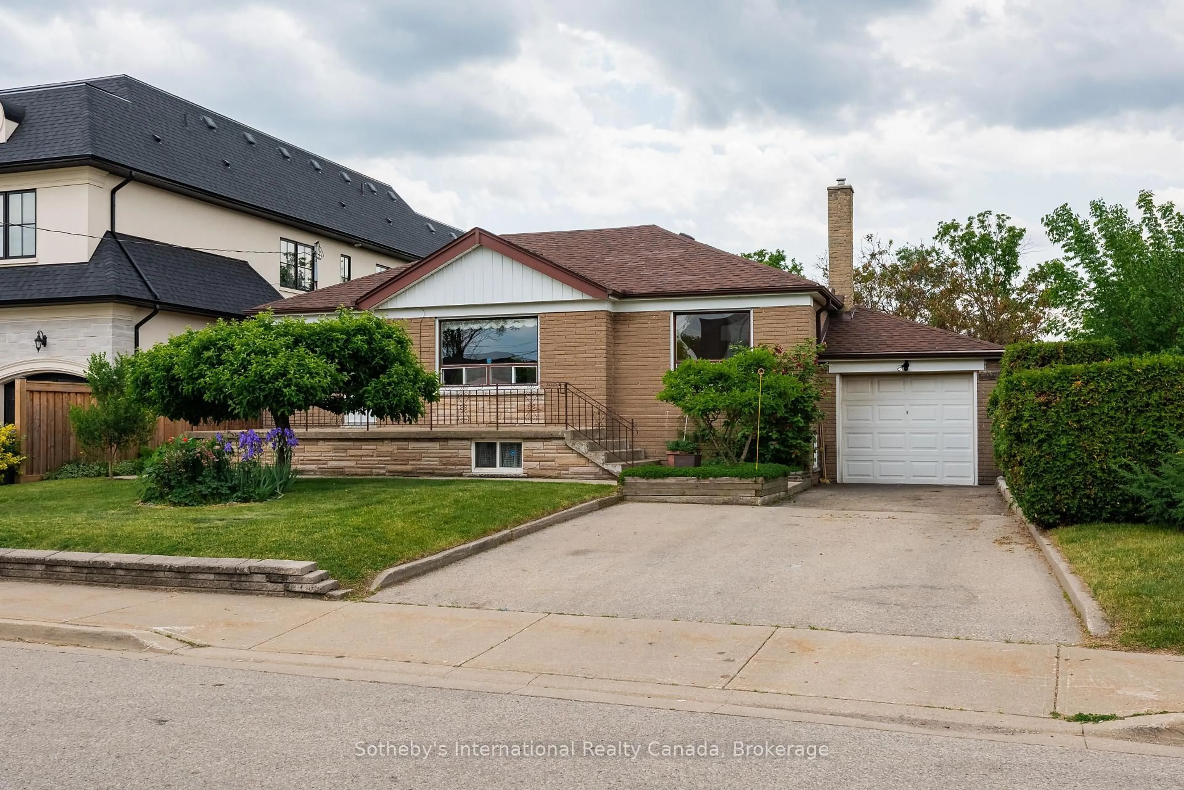Home with brick exterior material, street for 2468 Donnavale Dr, Mississauga Ontario L5A 2N1