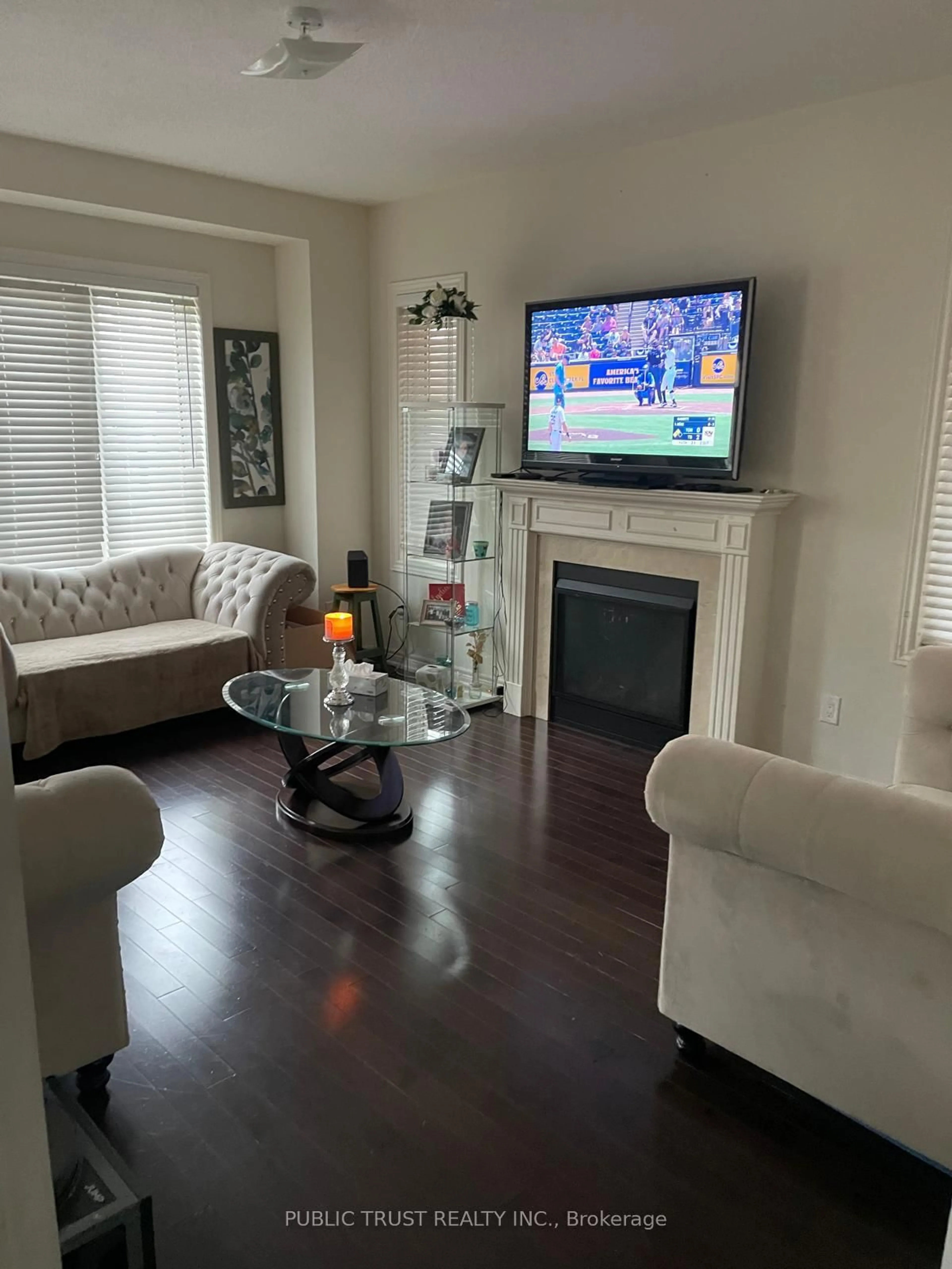 Living room with furniture, wood/laminate floor for 24 Masken Circ, Brampton Ontario L7A 0G4