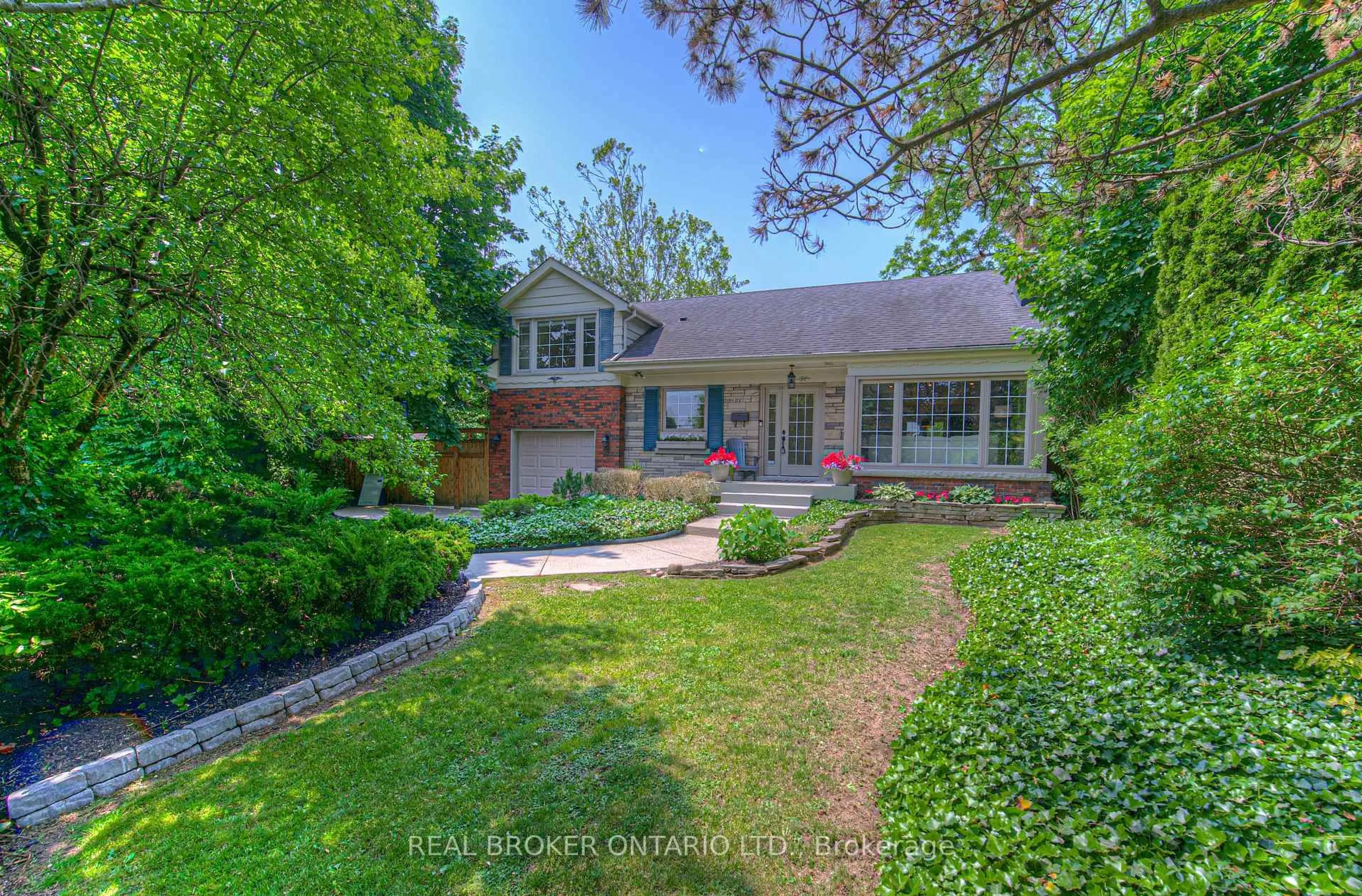 Home with brick exterior material, street for 976 Filmandale Rd, Burlington Ontario L7T 2Z4