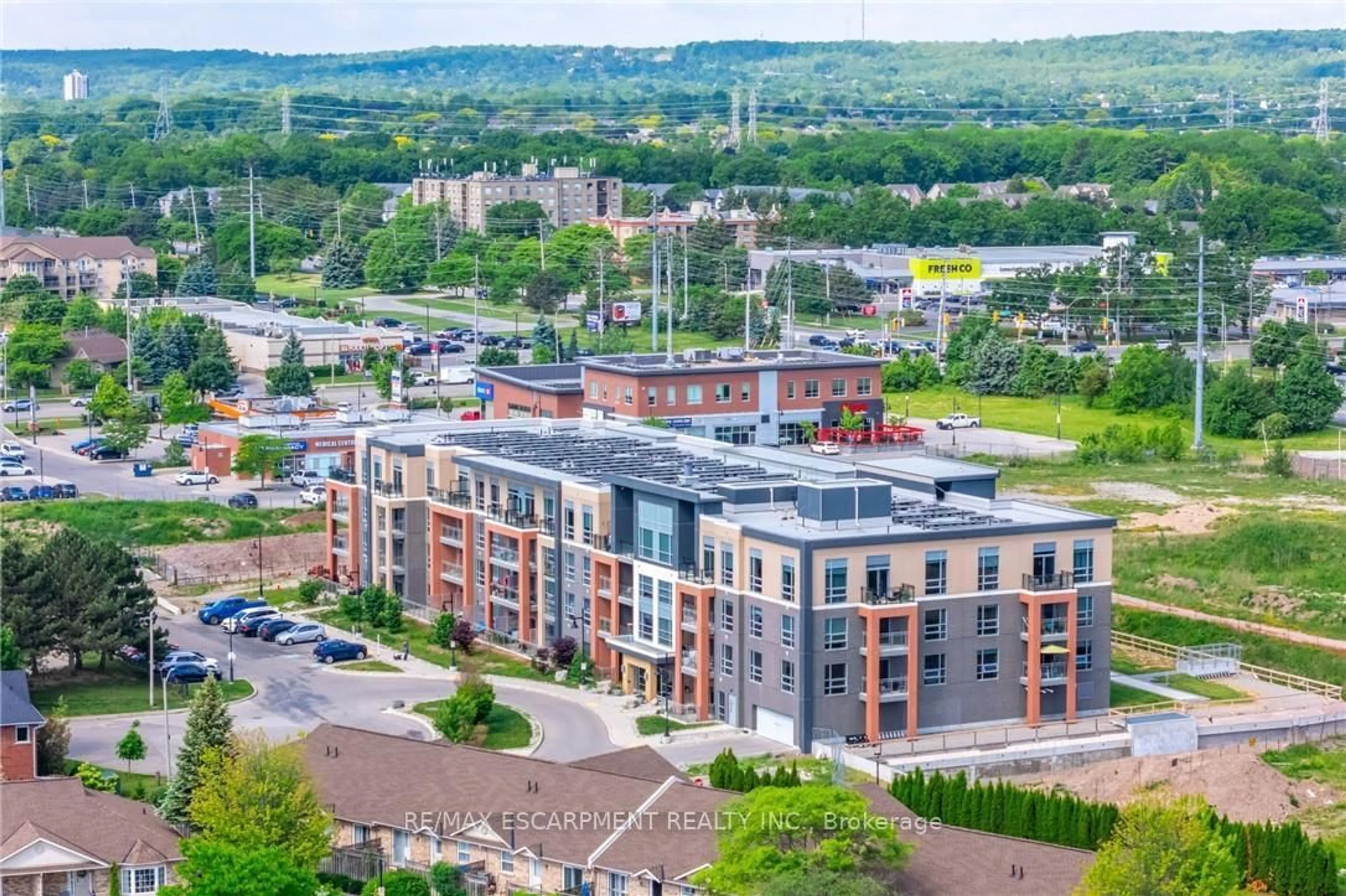 A pic from outside/outdoor area/front of a property/back of a property/a pic from drone, city buildings view from balcony for 4040 Upper Middle Rd #103, Burlington Ontario L7M 0H2