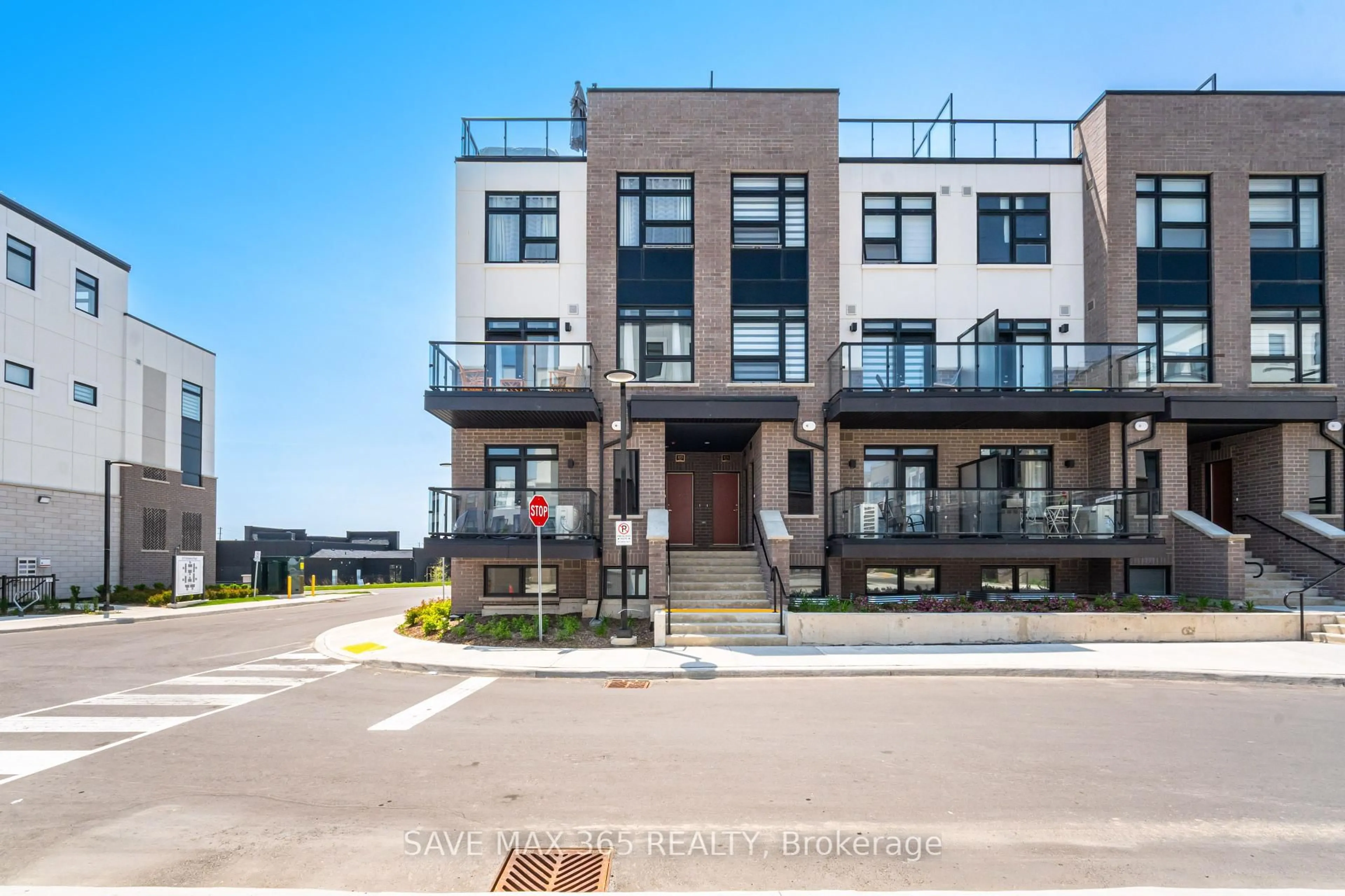 Home with brick exterior material, unknown for 1565 Rose Way #103, Milton Ontario L9E 1N4