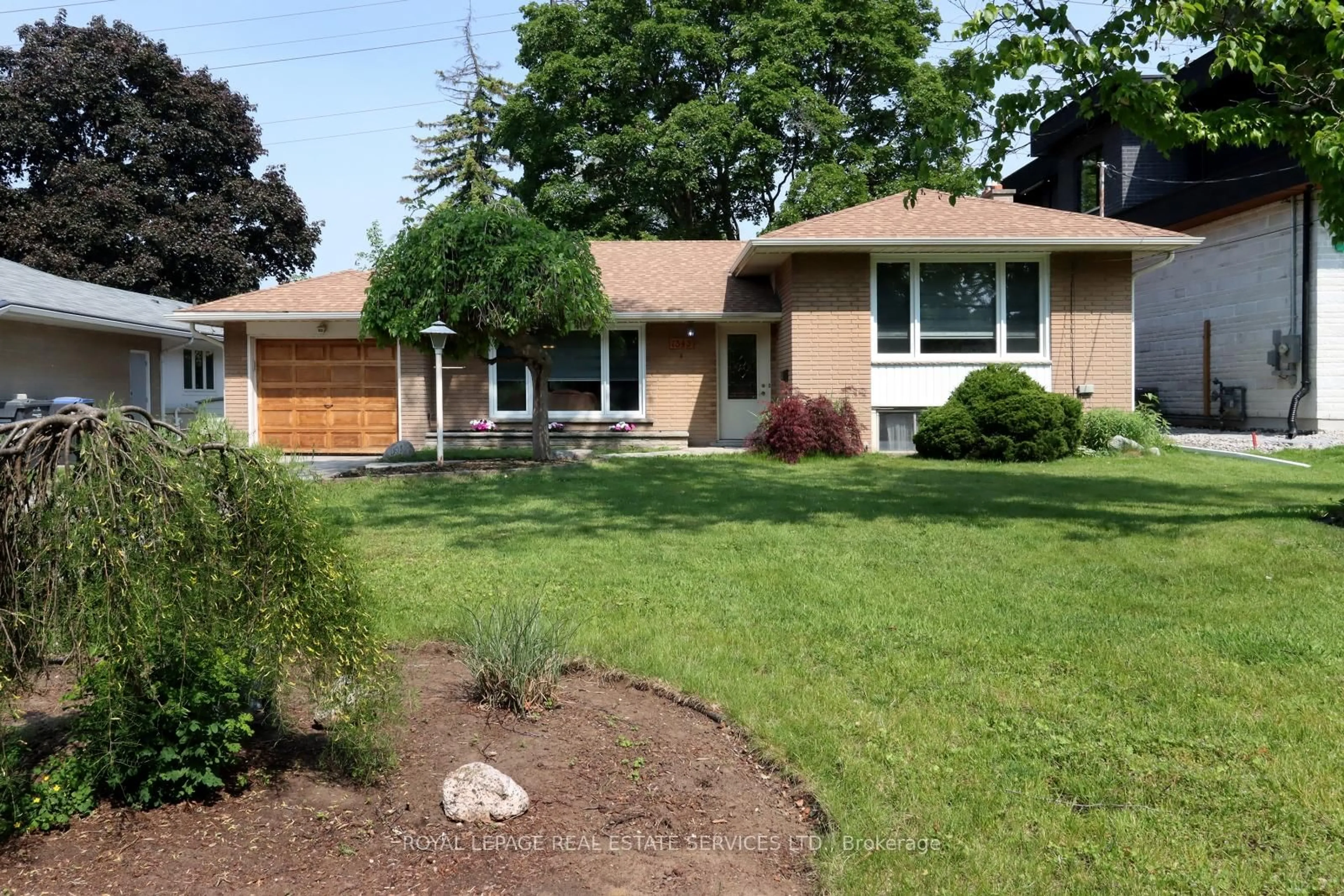 Home with vinyl exterior material, street for 1343 Melton Dr, Mississauga Ontario L4Y 1L6