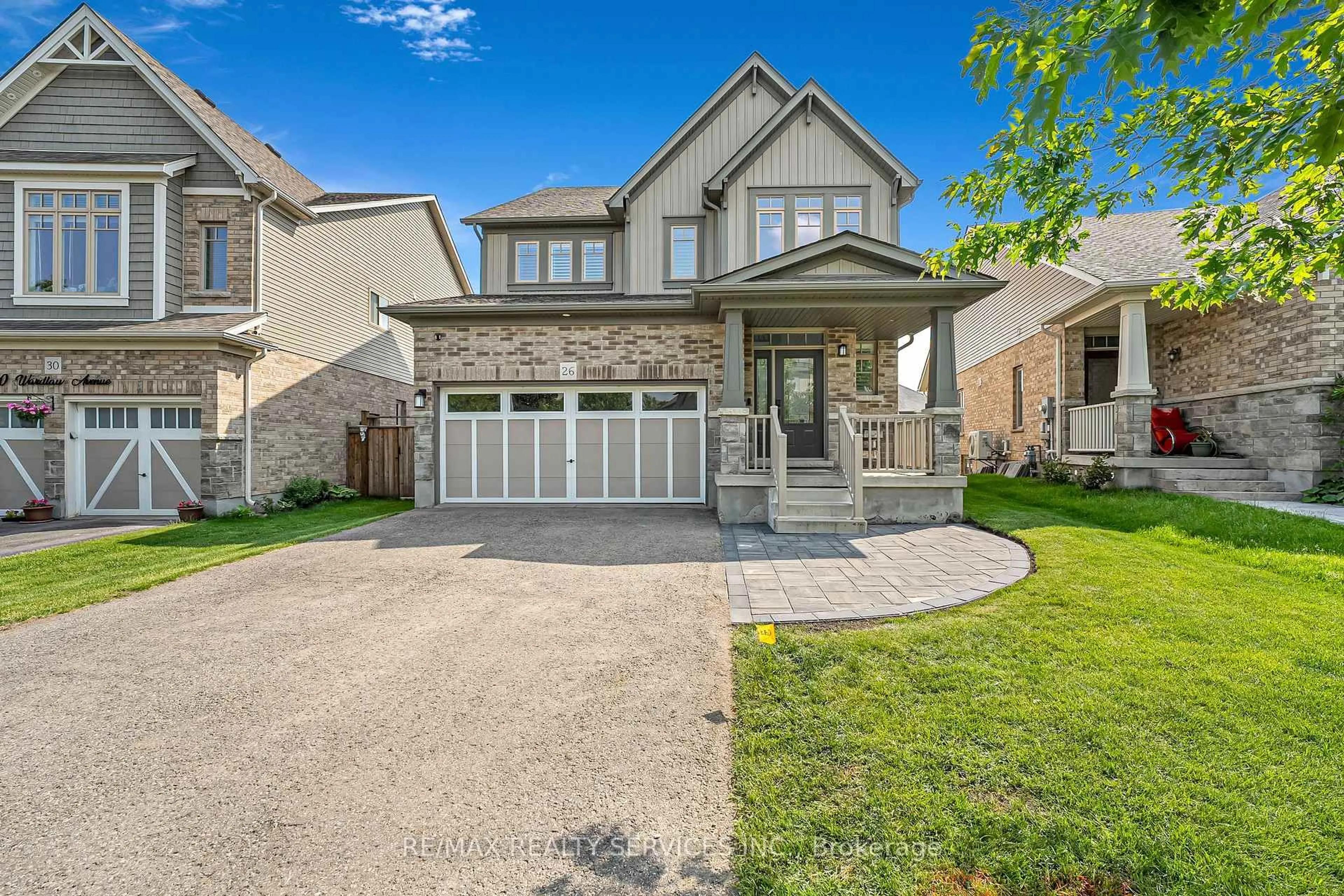 Home with brick exterior material, street for 26 Wardlaw Ave, Orangeville Ontario L9W 6K1