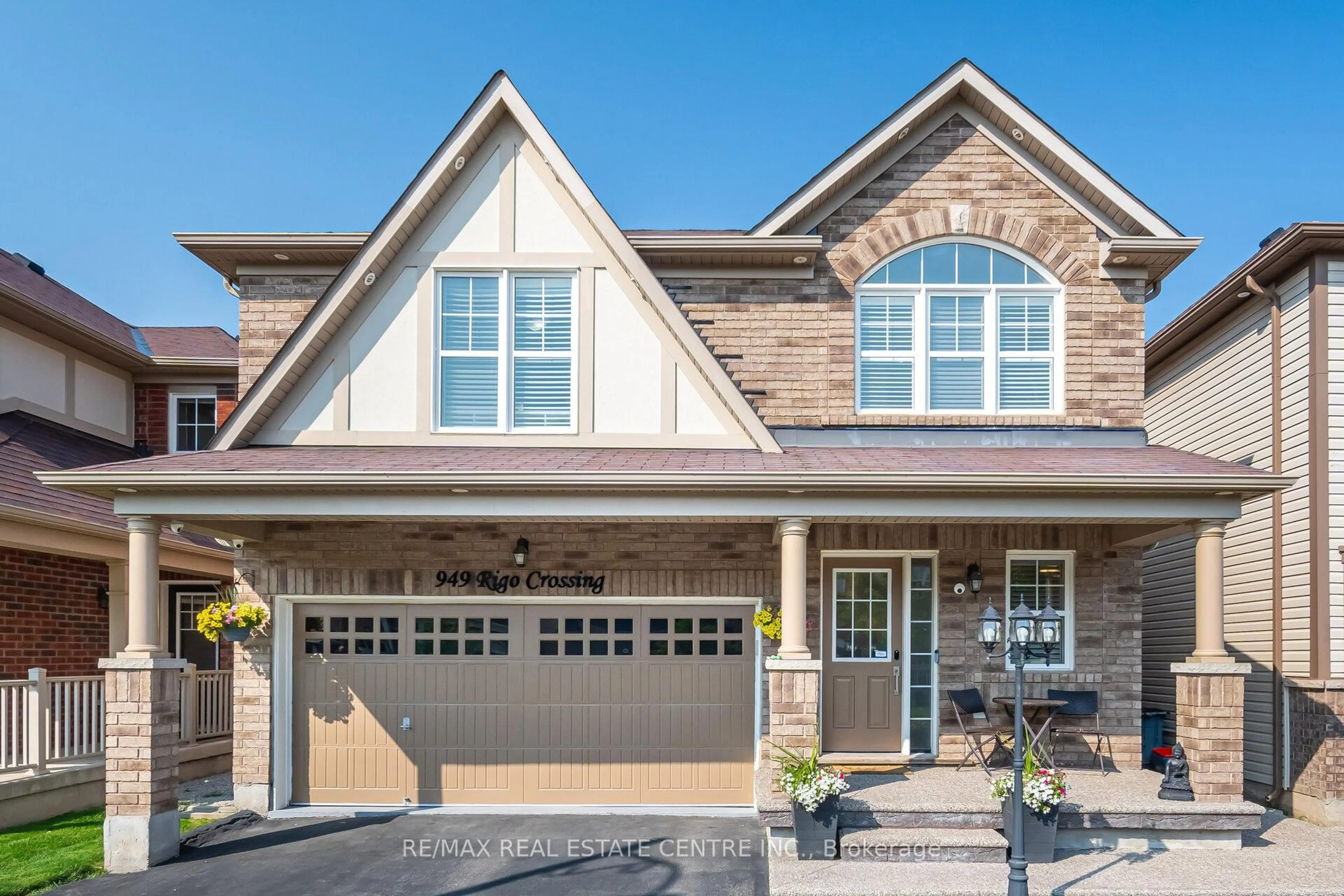 Home with brick exterior material, street for 949 Rigo Crossing, Milton Ontario L9T 8C5