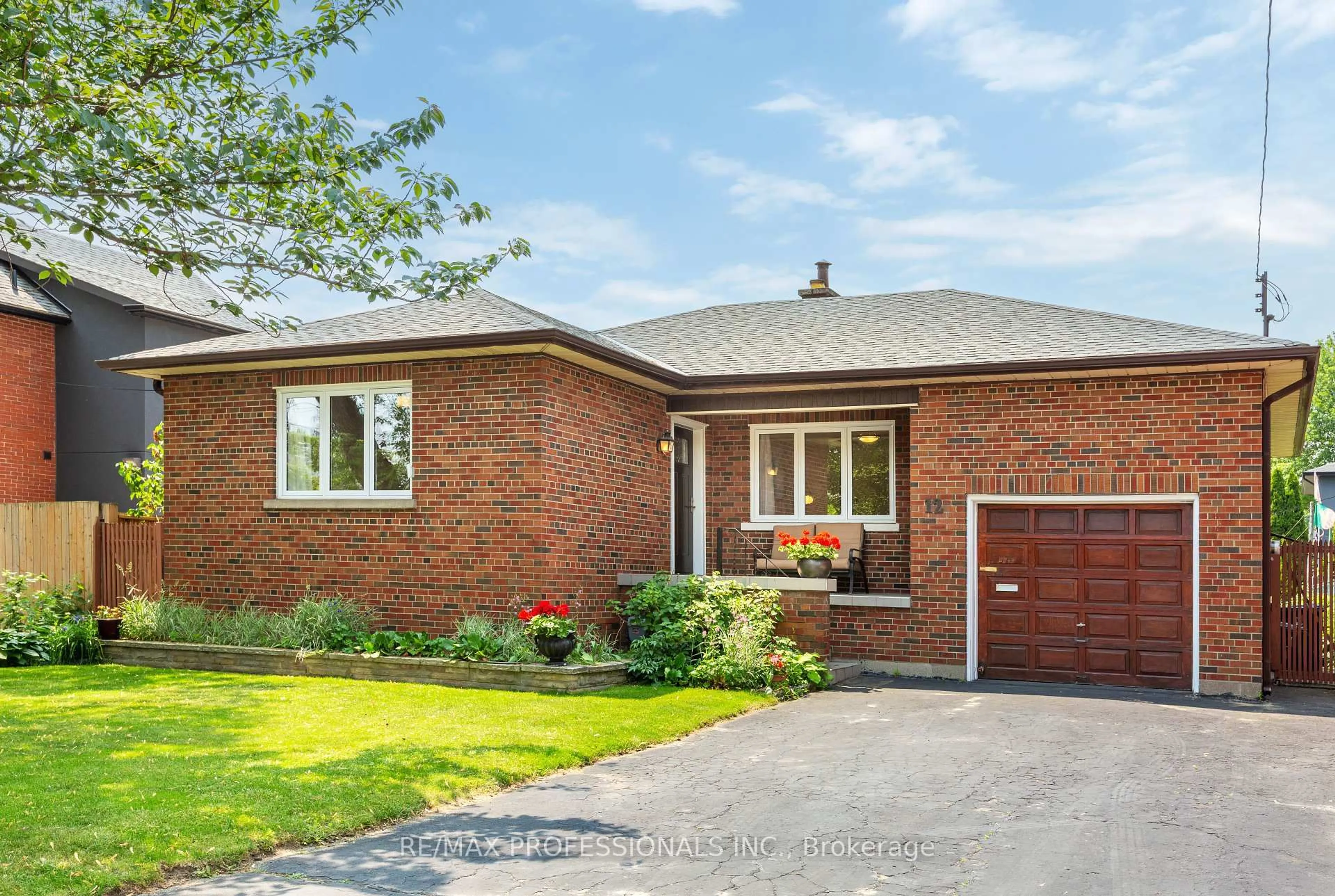 Home with brick exterior material, street for 12 Mcintosh Ave, Toronto Ontario M8Y 3C9