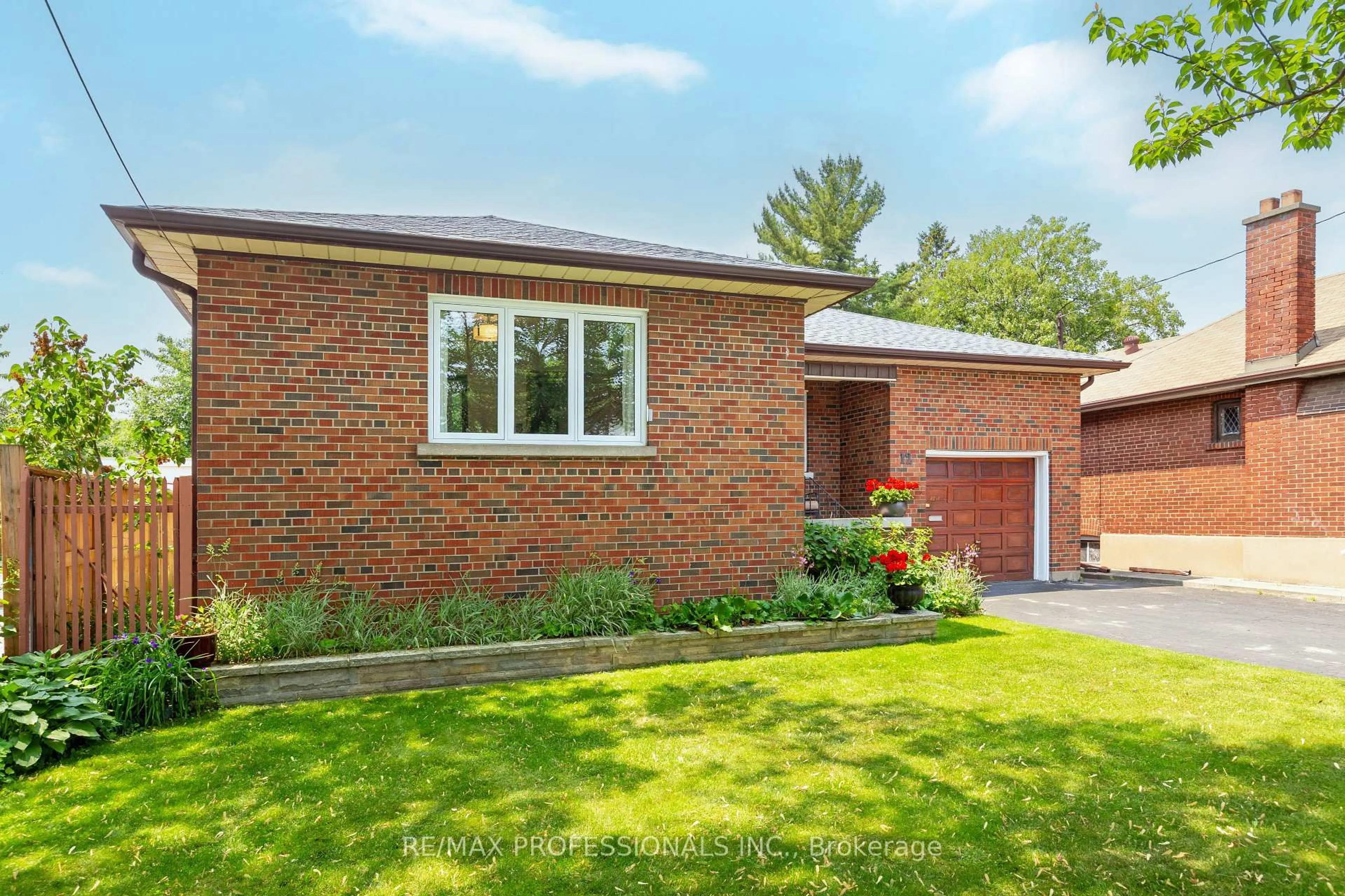Home with brick exterior material, street for 12 Mcintosh Ave, Toronto Ontario M8Y 3C9
