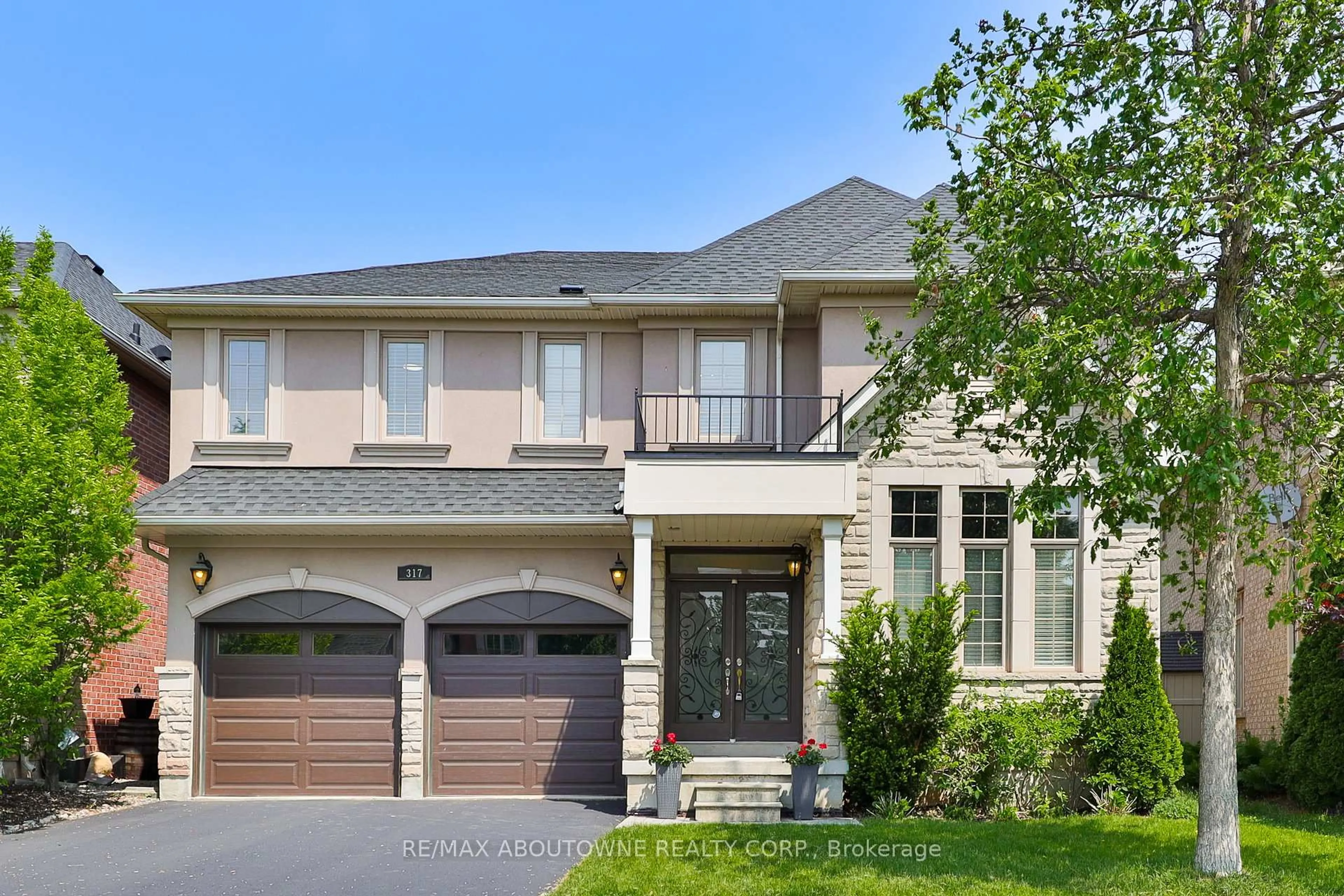 Home with brick exterior material, street for 317 Nautical Blvd, Oakville Ontario L6L 0C1