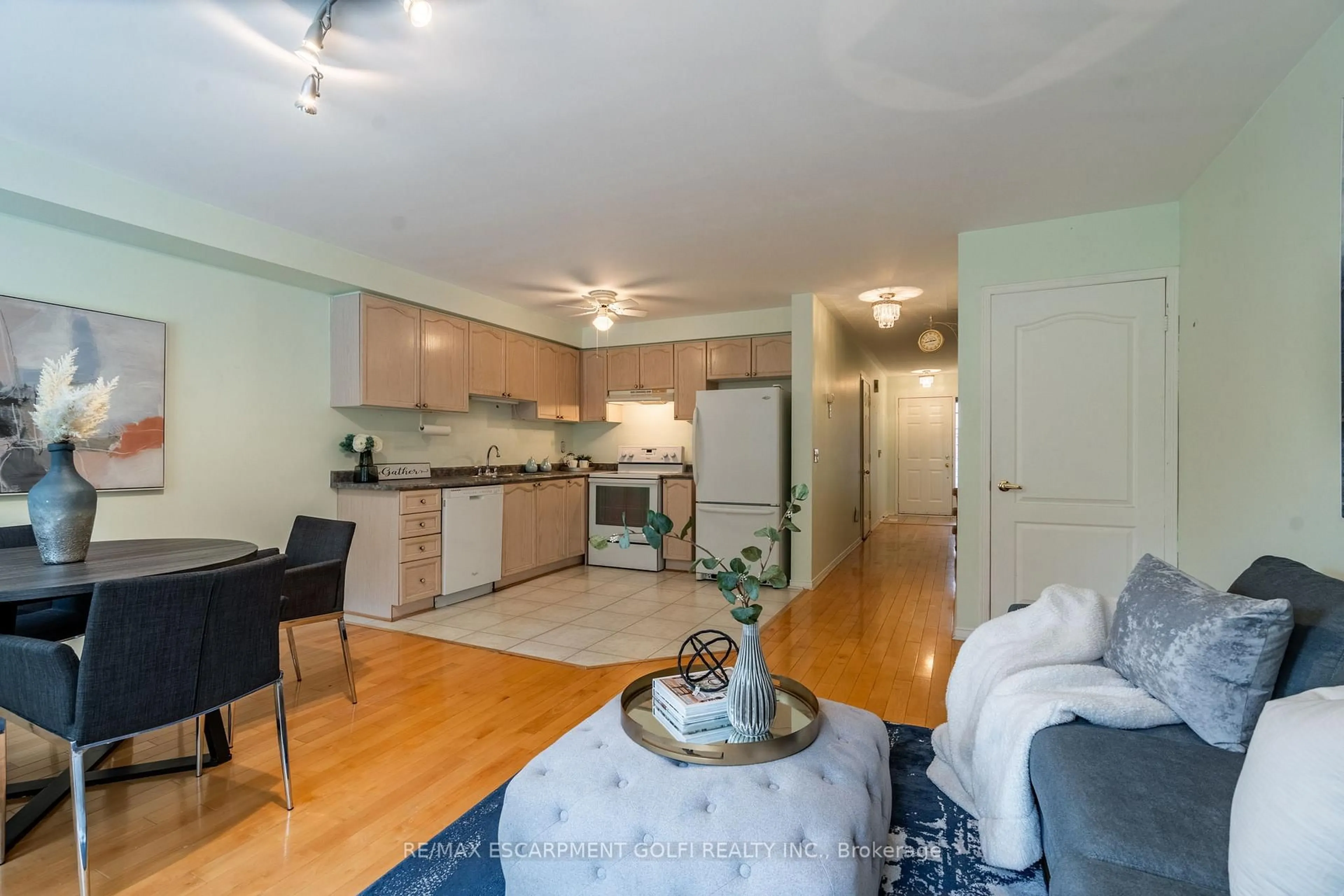 Open concept kitchen, wood/laminate floor for 710 Spring Gardens Rd #44, Burlington Ontario L7T 4K7
