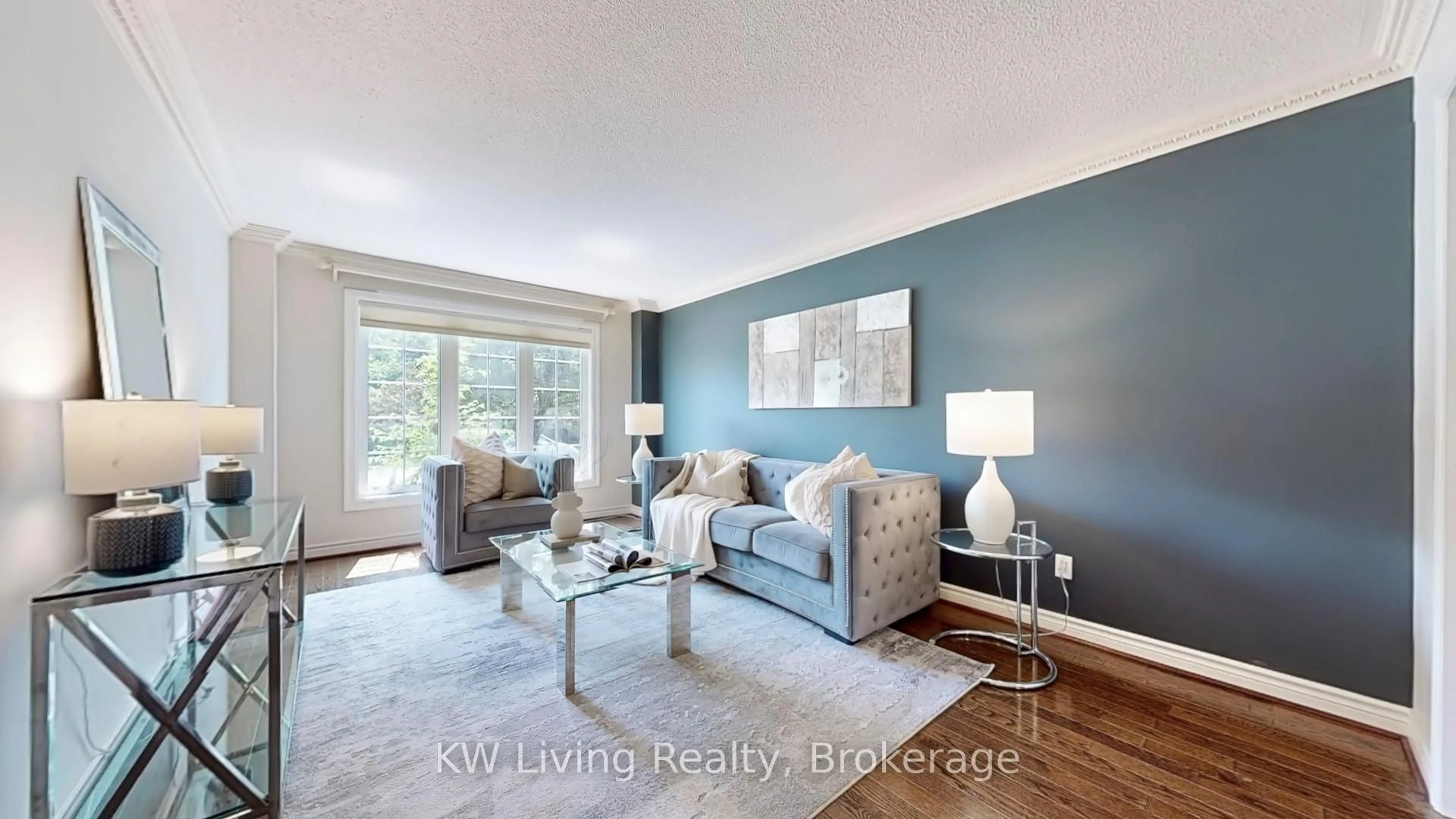 Living room with furniture, wood/laminate floor for 1997 Sandown Rd, Mississauga Ontario L5M 2Z5