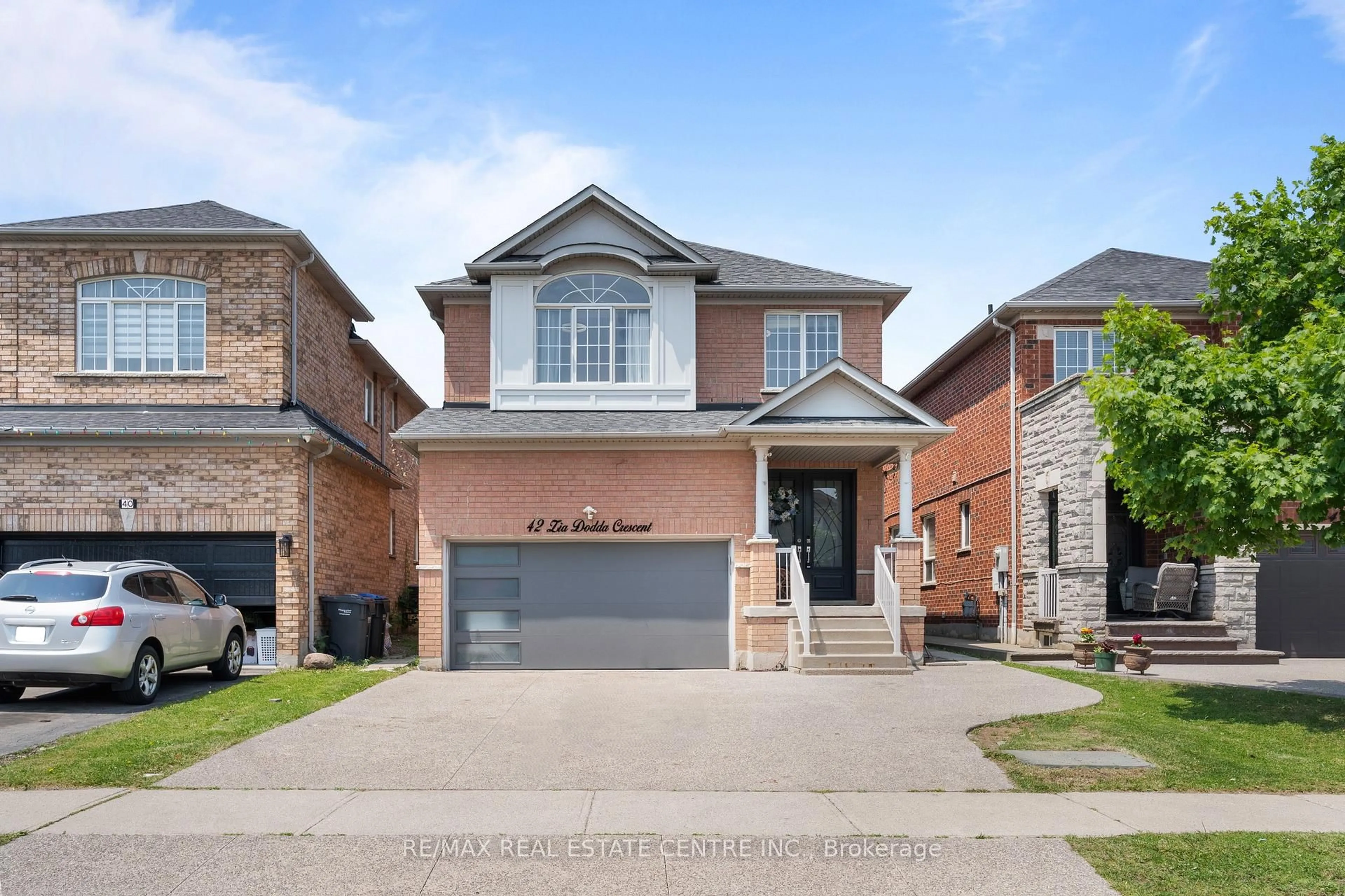 Home with brick exterior material, street for 42 Zia Dodda Cres, Brampton Ontario L6P 1J6