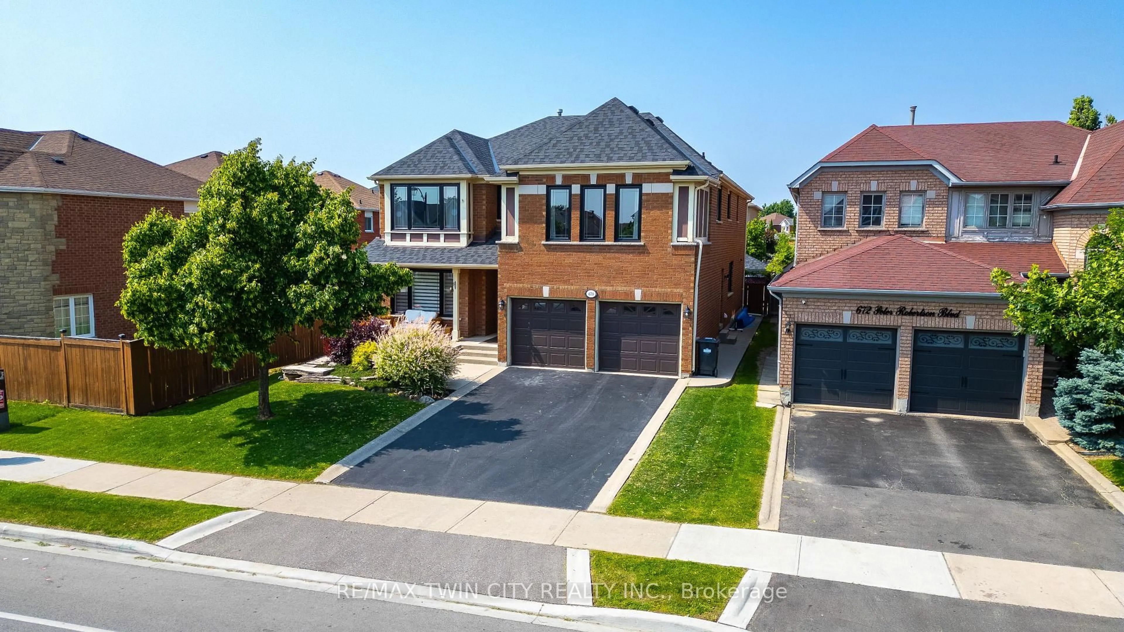 Home with brick exterior material, street for 670 Peter Robertson Blvd, Brampton Ontario L6R 1L8