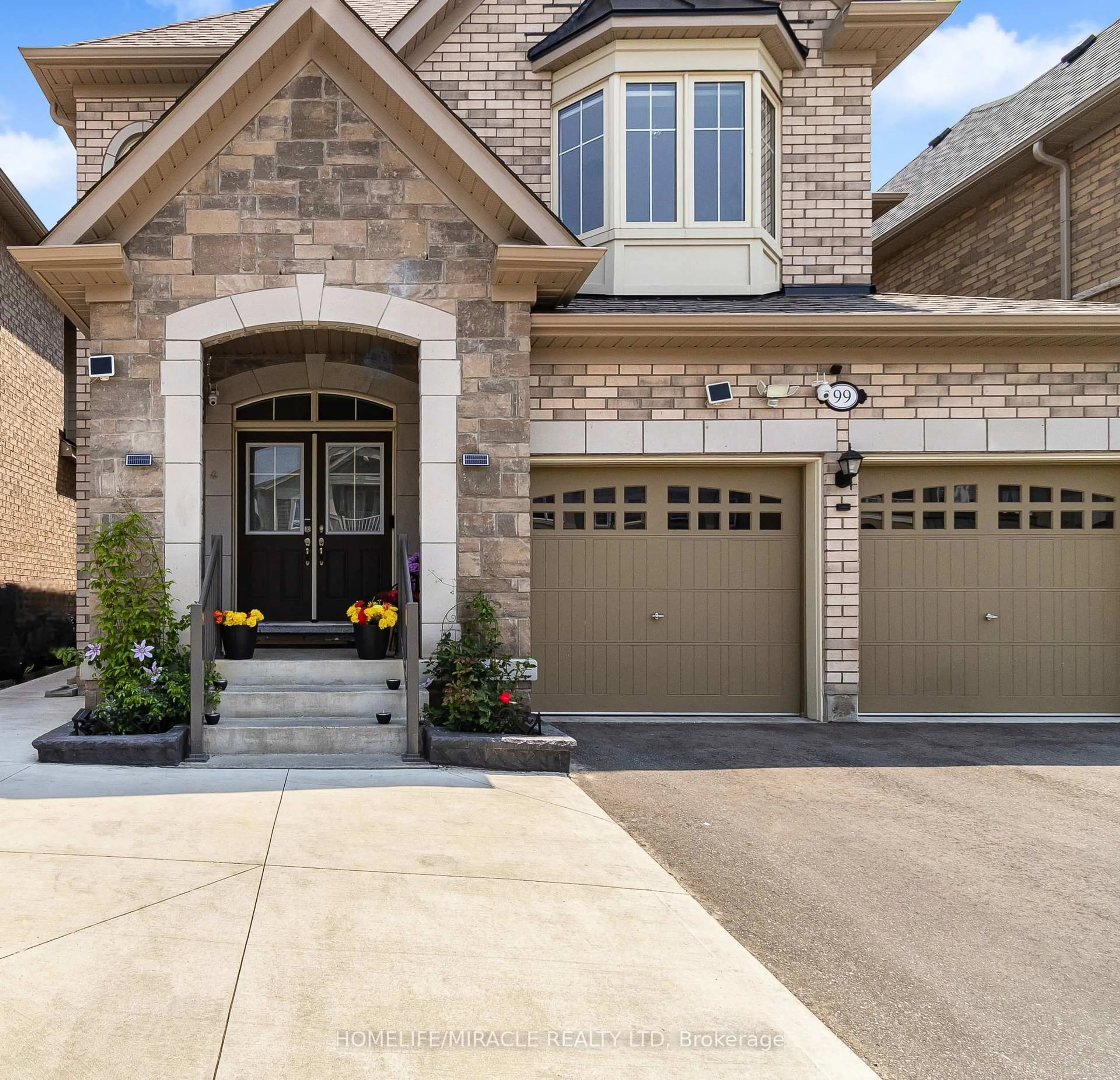 Home with brick exterior material, street for 99 Benhurst Cres, Brampton Ontario L7A 5A4