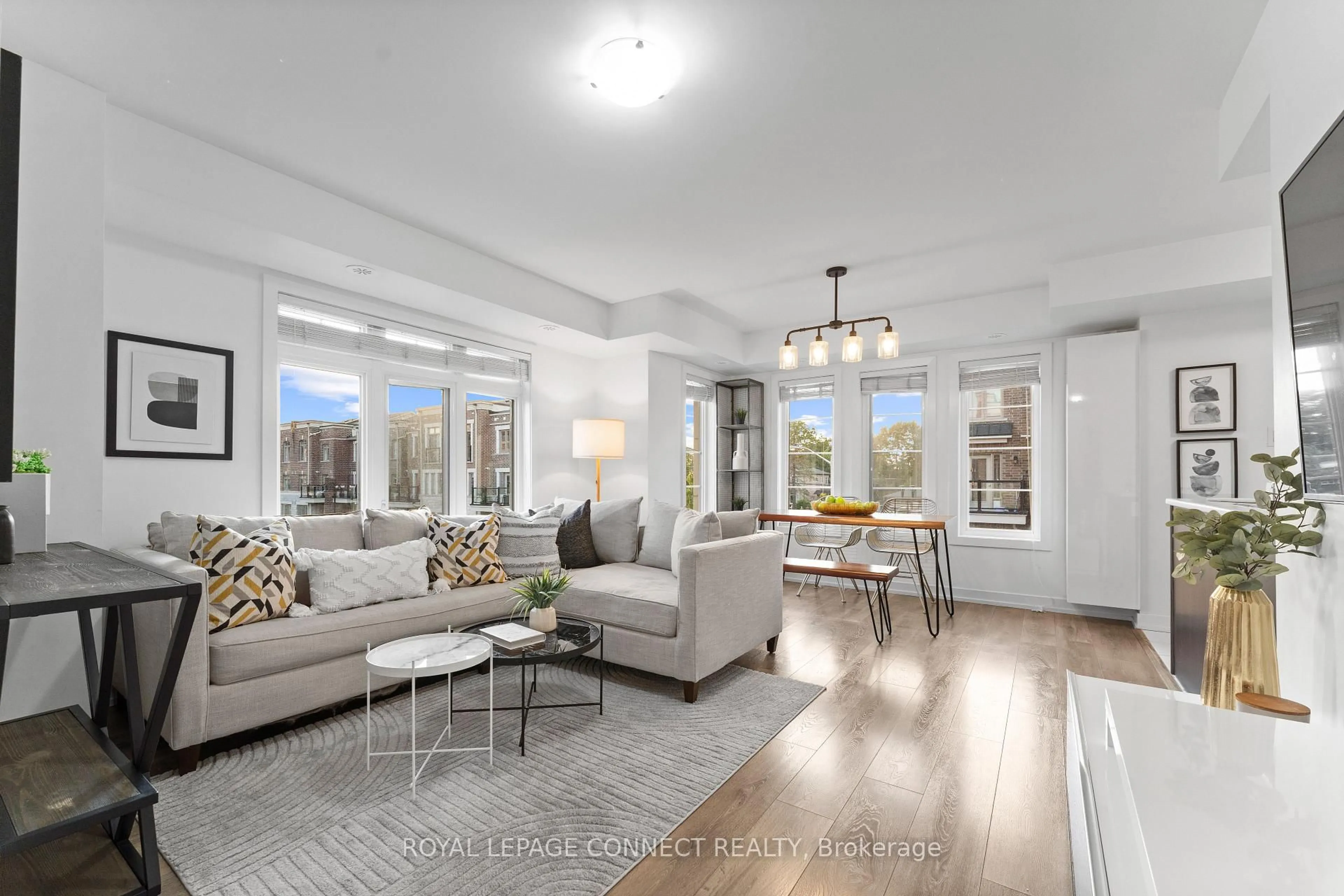 Living room with furniture, unknown for 80 Parrotta Dr #151, Toronto Ontario M9M 0B5