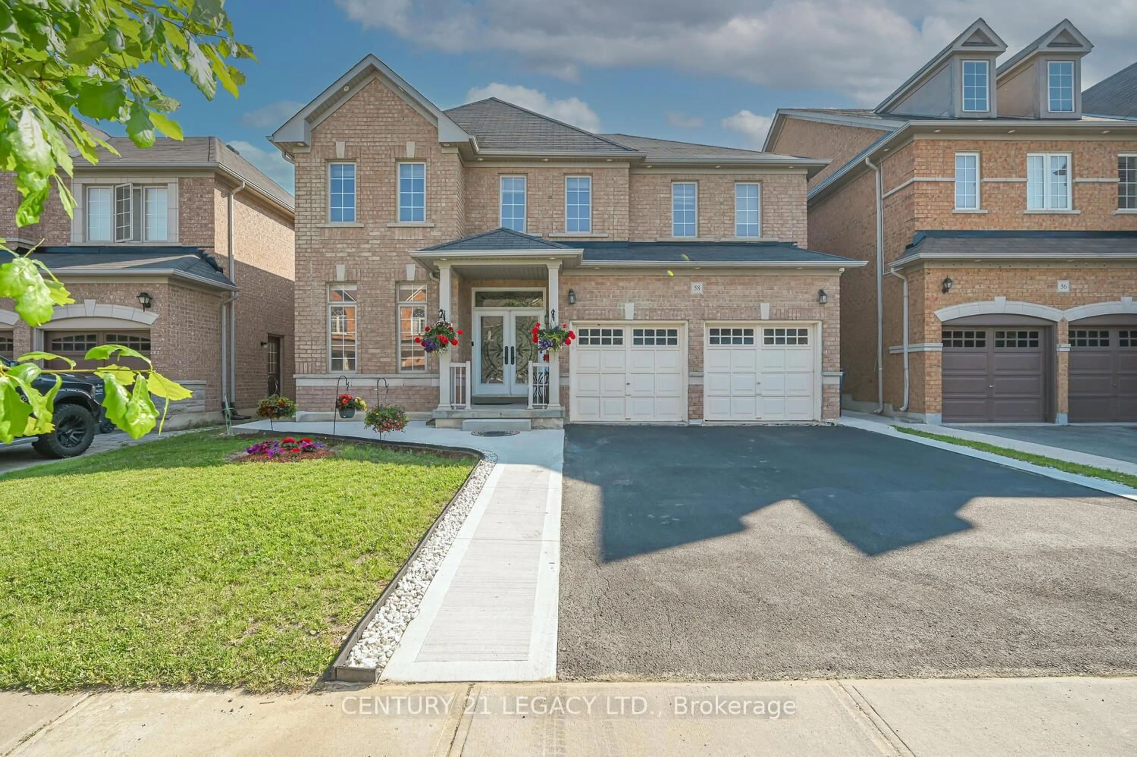 Home with brick exterior material, street for 58 Gamson Cres, Brampton Ontario L6R 0V6