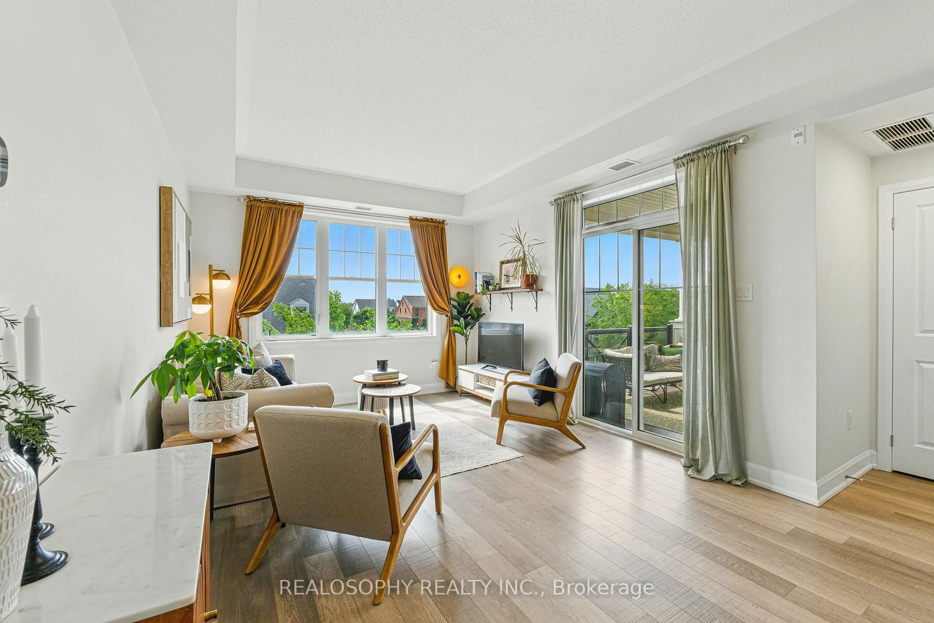 Living room with furniture, unknown for 2333 Sawgrass Dr #304, Oakville Ontario L6H 0L2