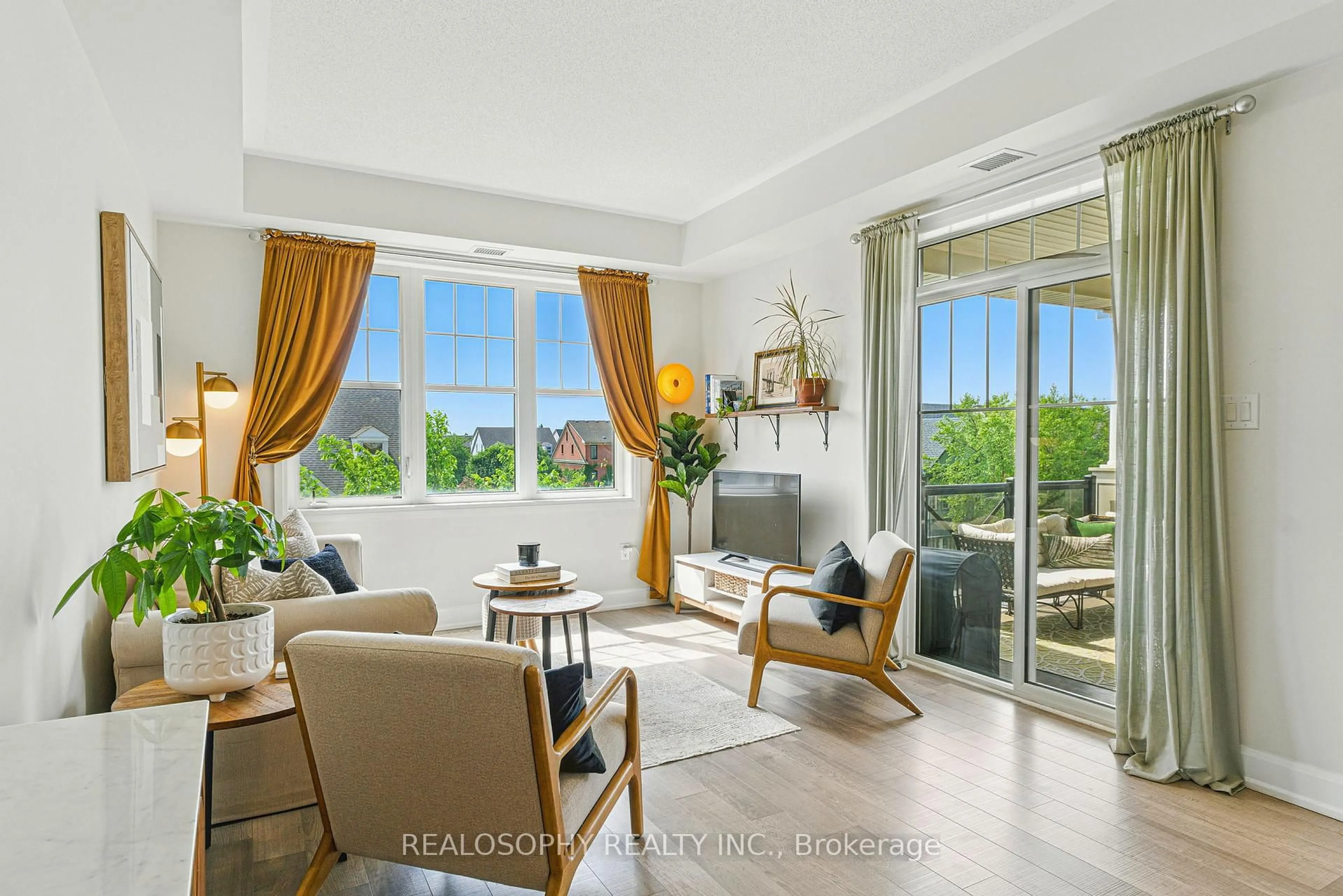 Living room with furniture, unknown for 2333 Sawgrass Dr #304, Oakville Ontario L6H 0L2