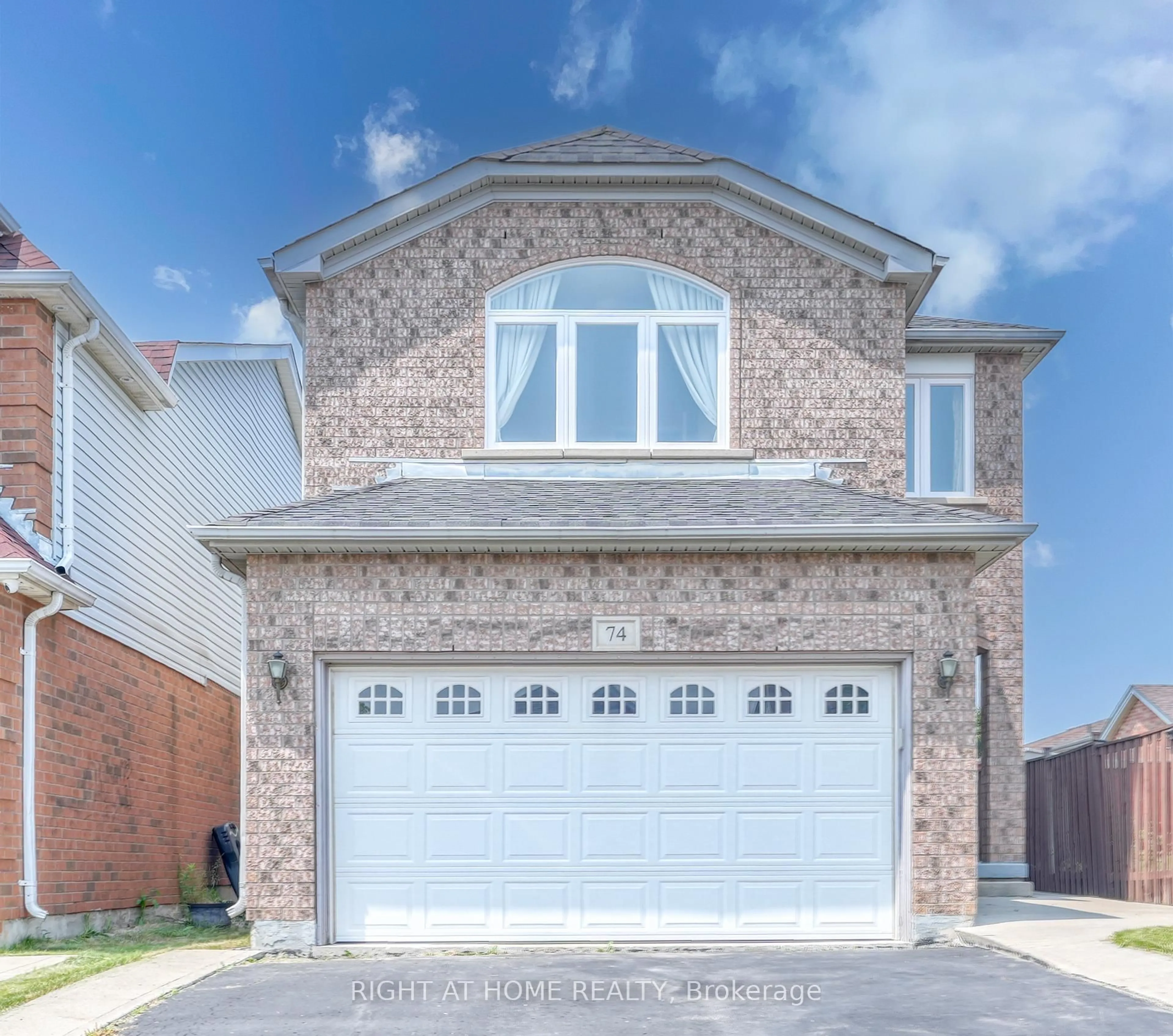 Home with brick exterior material, street for 74 Feathertop Lane, Brampton Ontario L6R 1X1