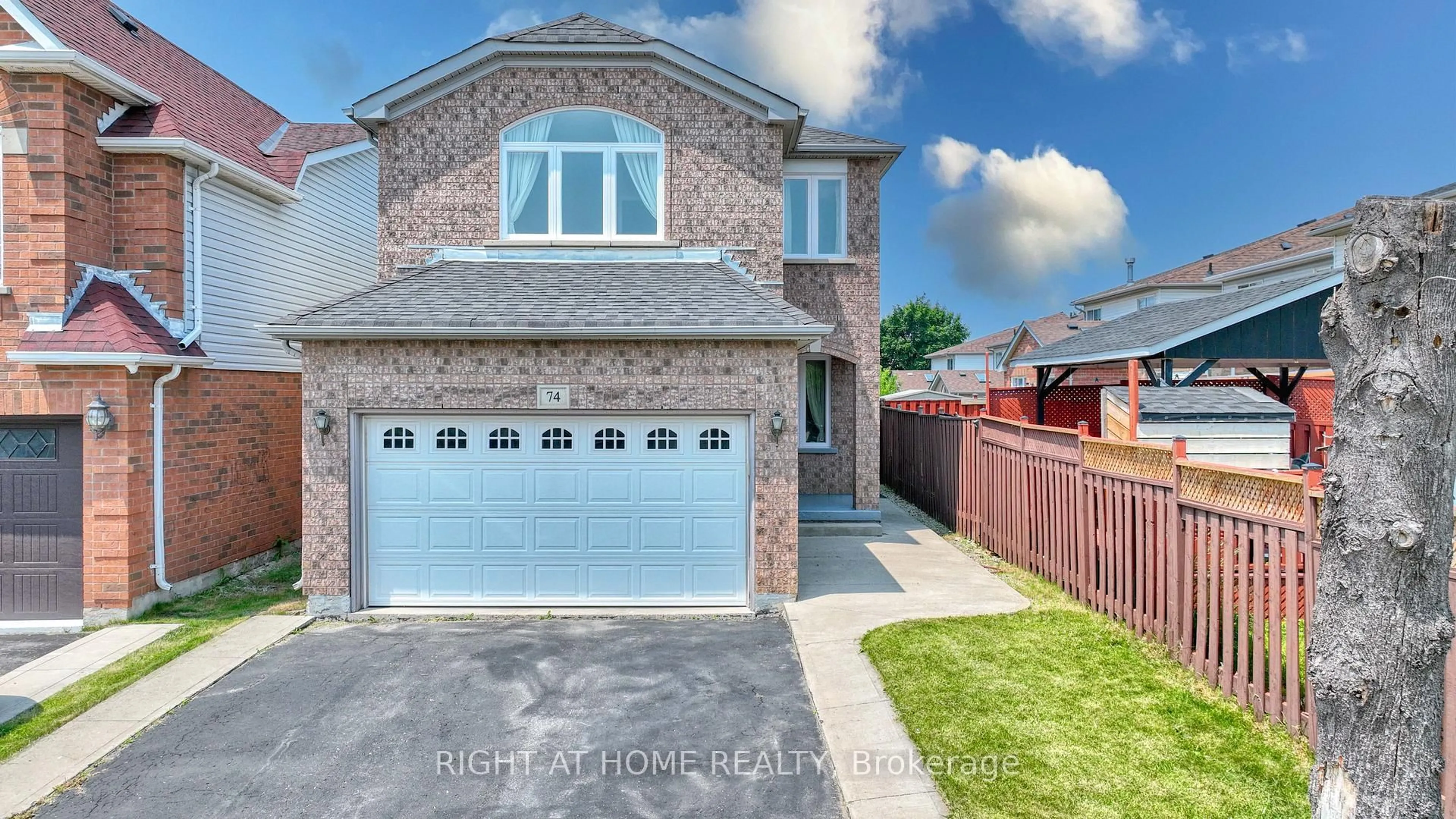 Home with brick exterior material, street for 74 Feathertop Lane, Brampton Ontario L6R 1X1