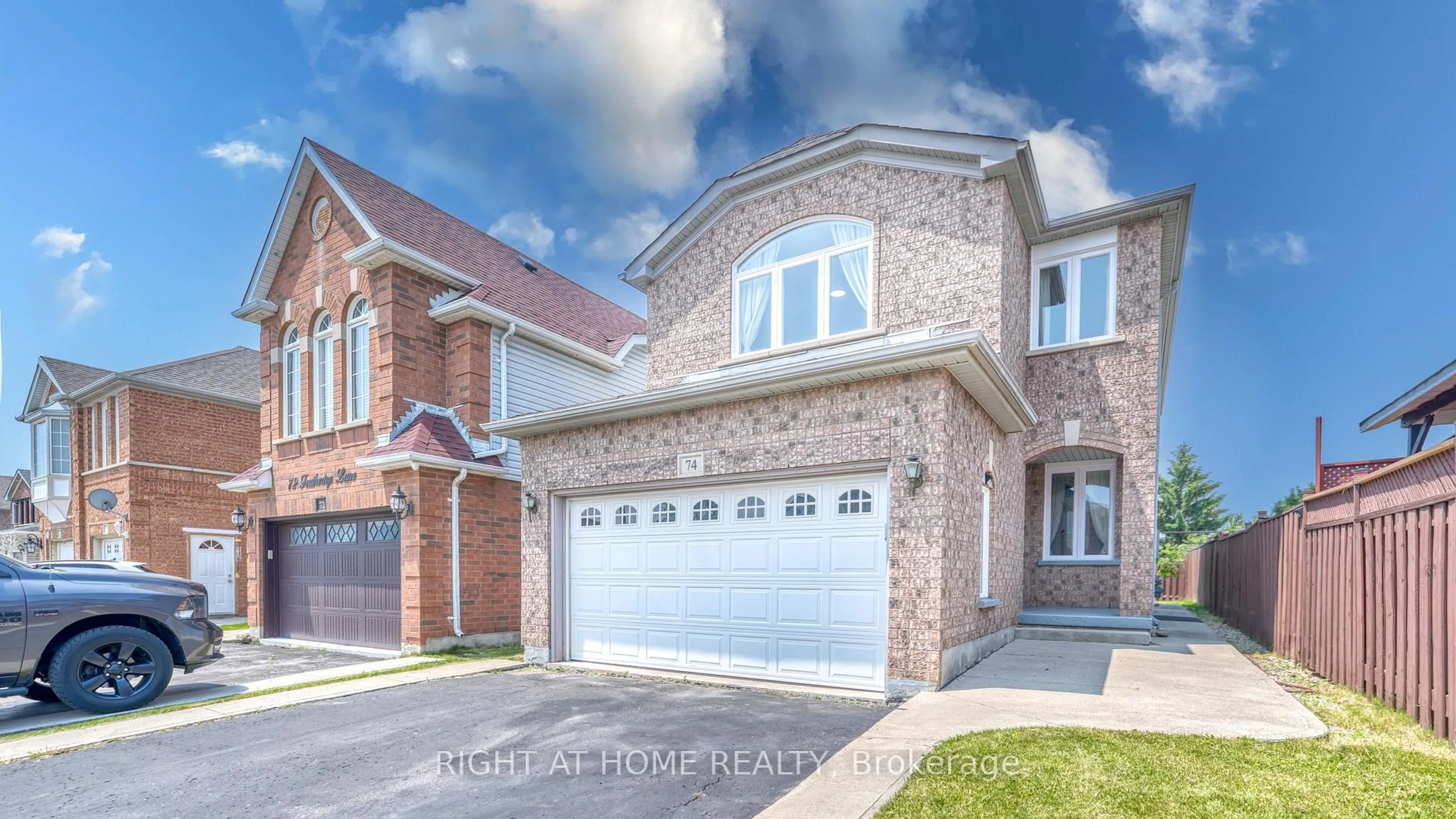 Home with brick exterior material, street for 74 Feathertop Lane, Brampton Ontario L6R 1X1